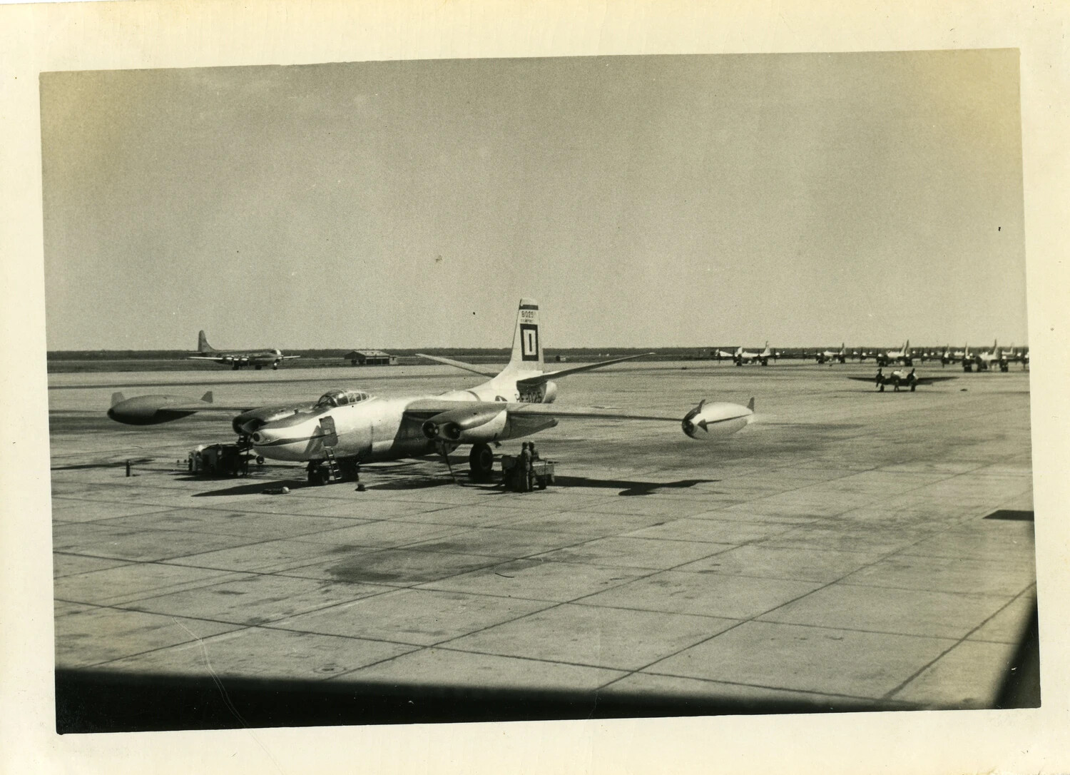 U.S. Navy Straight-Wing Jet Fighter (Grumman F9F Panther type) on Ramp, Naval Air Station, 1950s