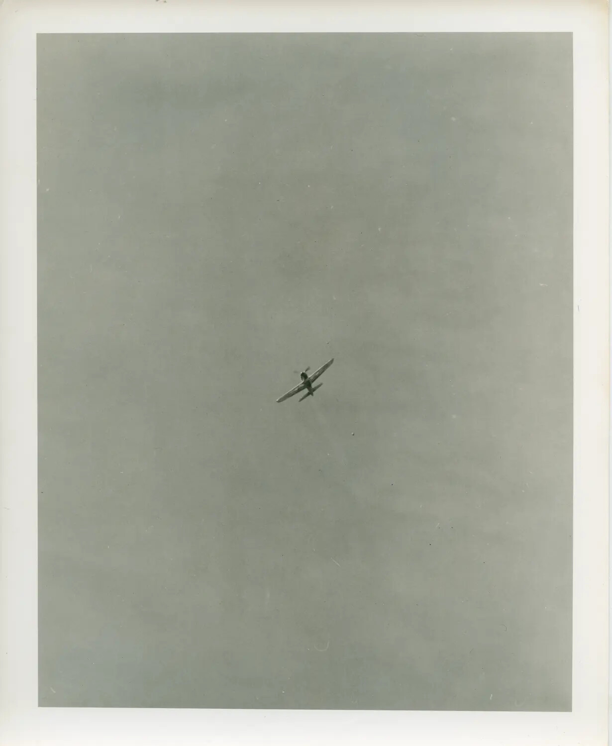 Distant Aircraft in Flight, USS Petrof Bay (CVE-80) Collection, WWII Pacific Theater