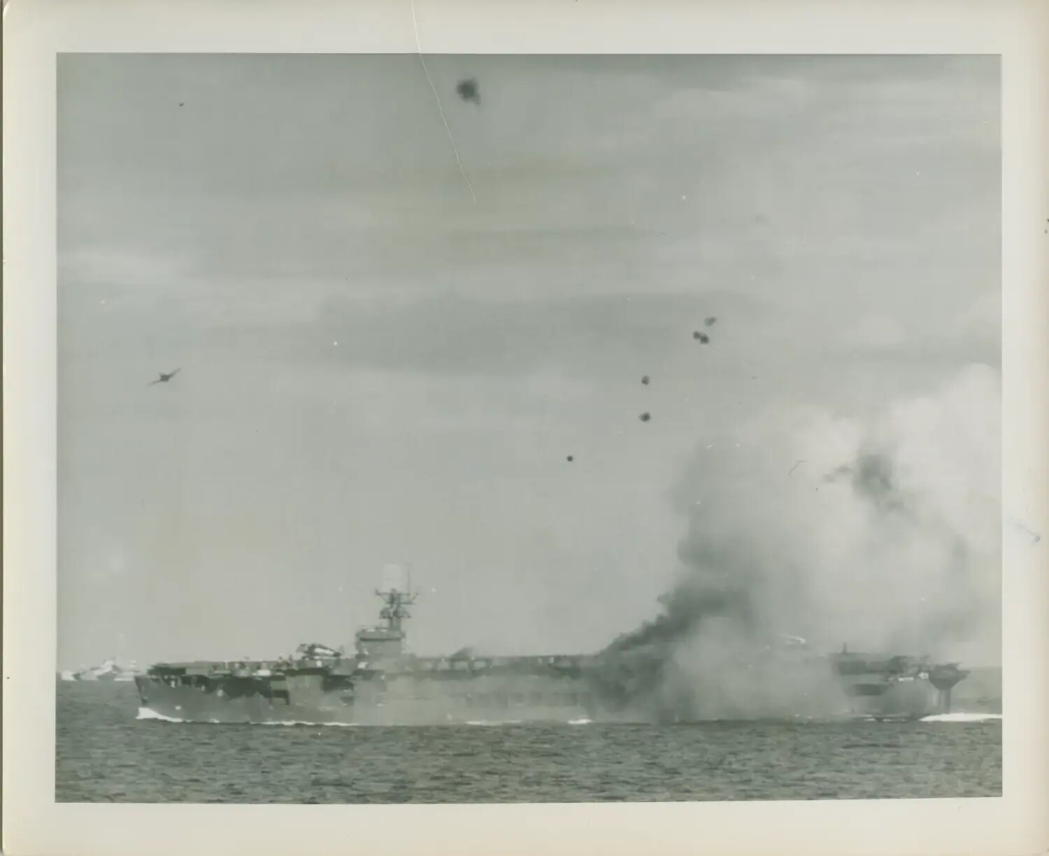 USS Petrof Bay (CVE-80) Under Kamikaze Attack, Smoke Billowing from Flight Deck, WWII Pacific Theater
