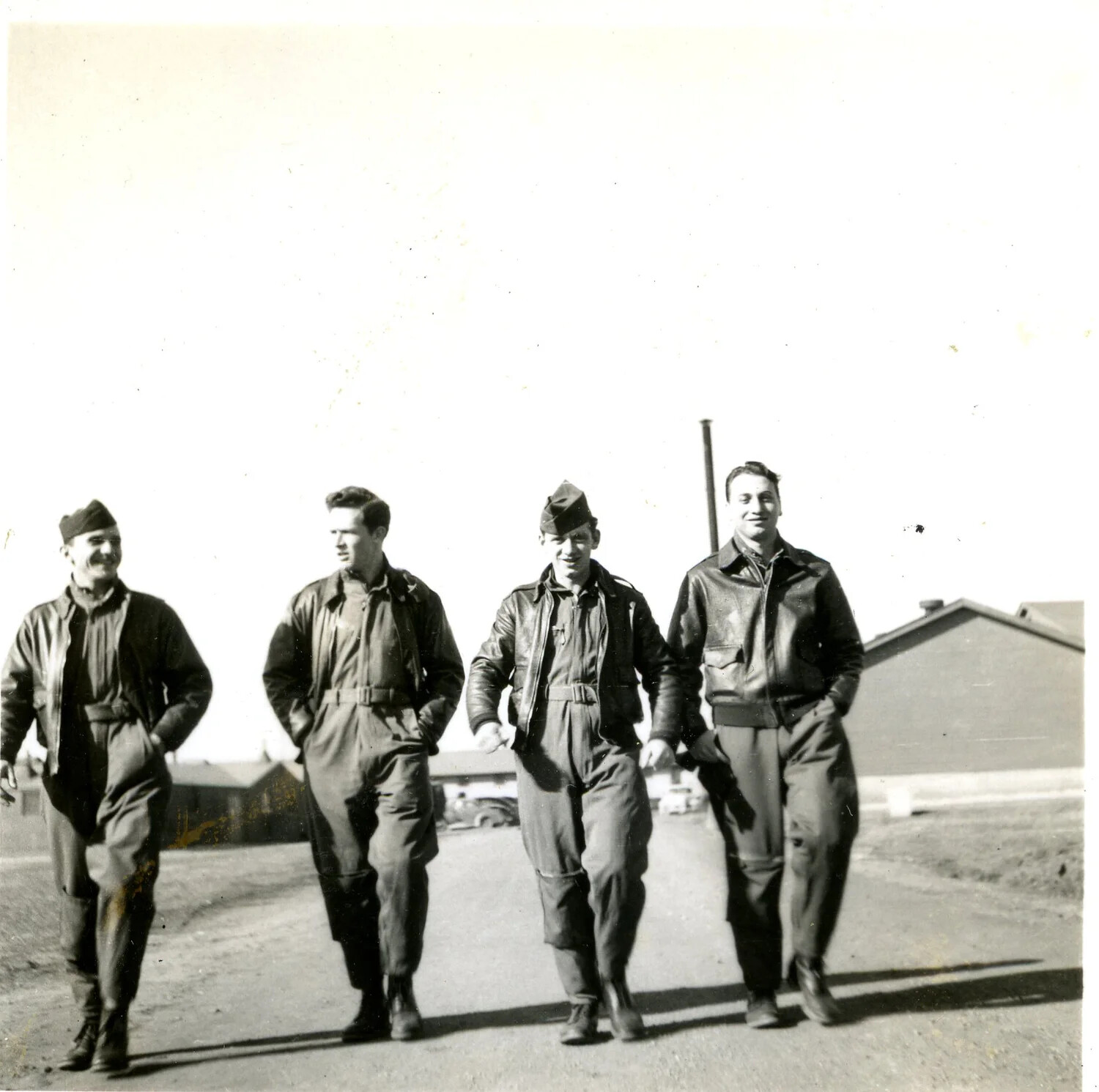 Four Airmen Walking on Base, 345th Bombardment Group, Pacific Theater