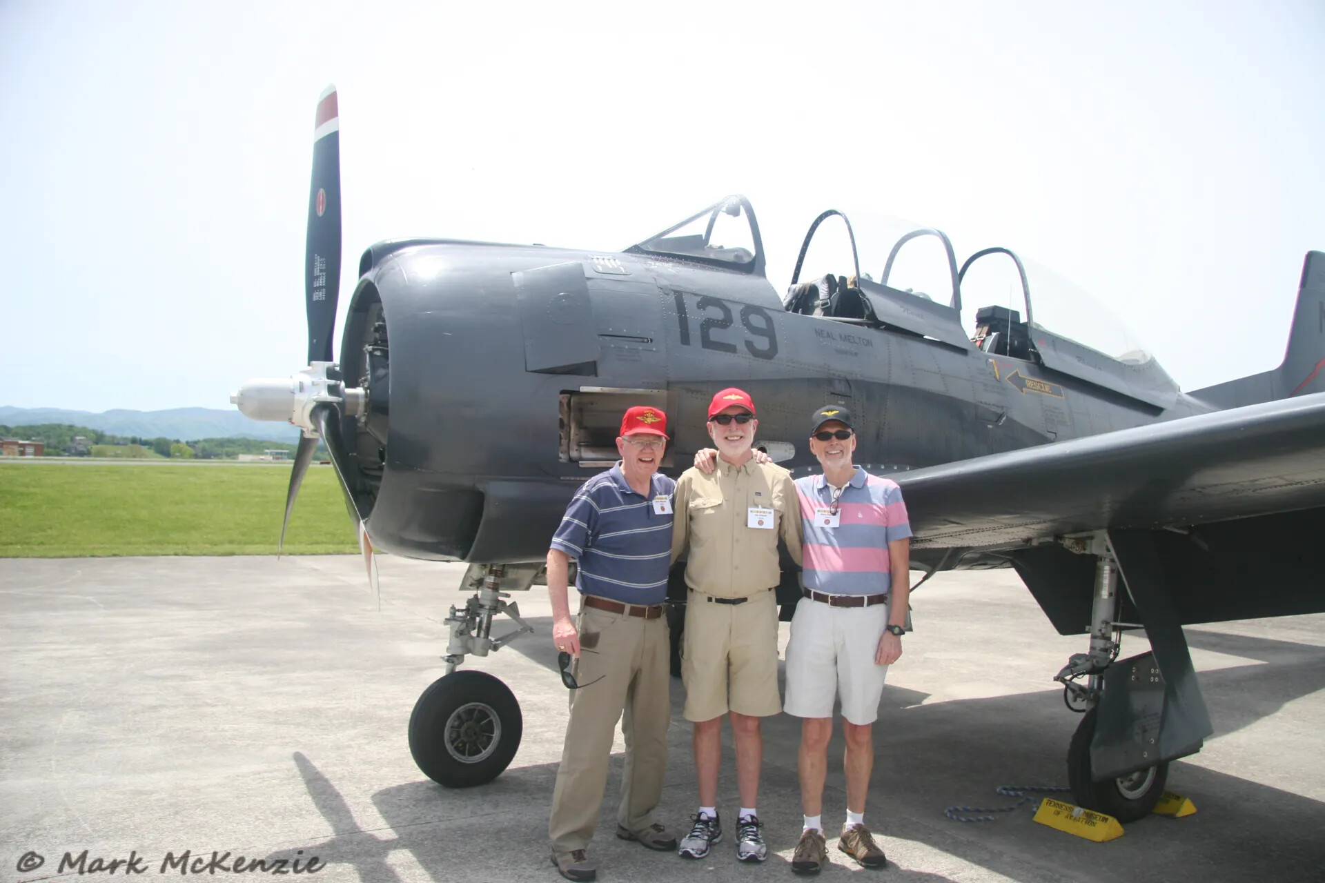 Three Reunion Attendees with T-28 Trojan 'Neal Melton,' Operation Tailwind Event