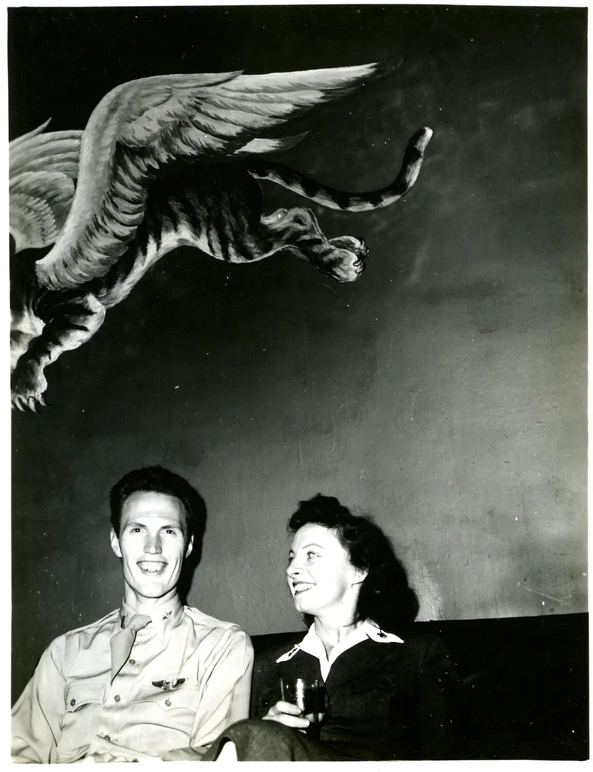 USAAF Aviator and Companion Beneath Flying Tiger Mural, China-Burma-India Theater, WWII