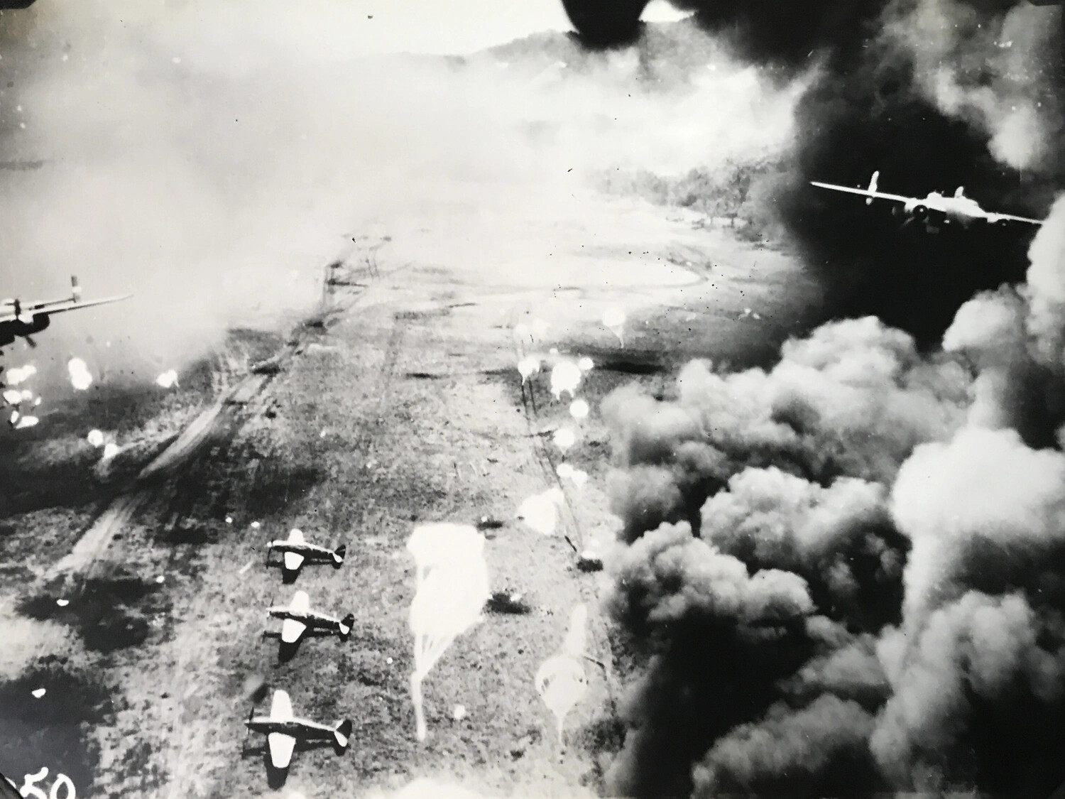 B-25 Mitchell Strike Sequence - Japanese Airfield Under Attack, Wewak Area, New Guinea