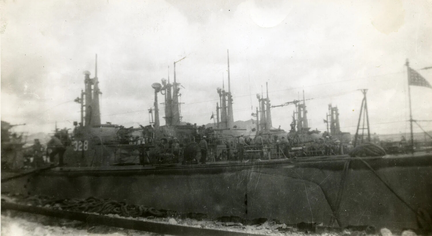 USS Charr (SS-328) Moored with Nested Submarines at Naval Submarine Base