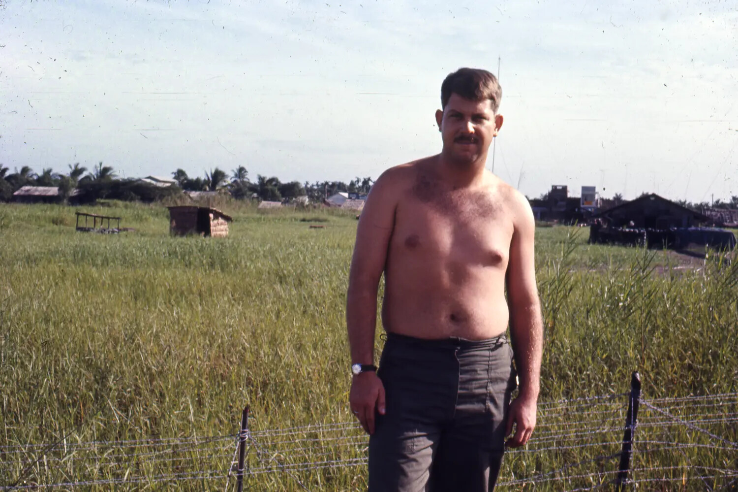 American Serviceman at Perimeter Fence, Rural Vietnam, Vietnam War Era