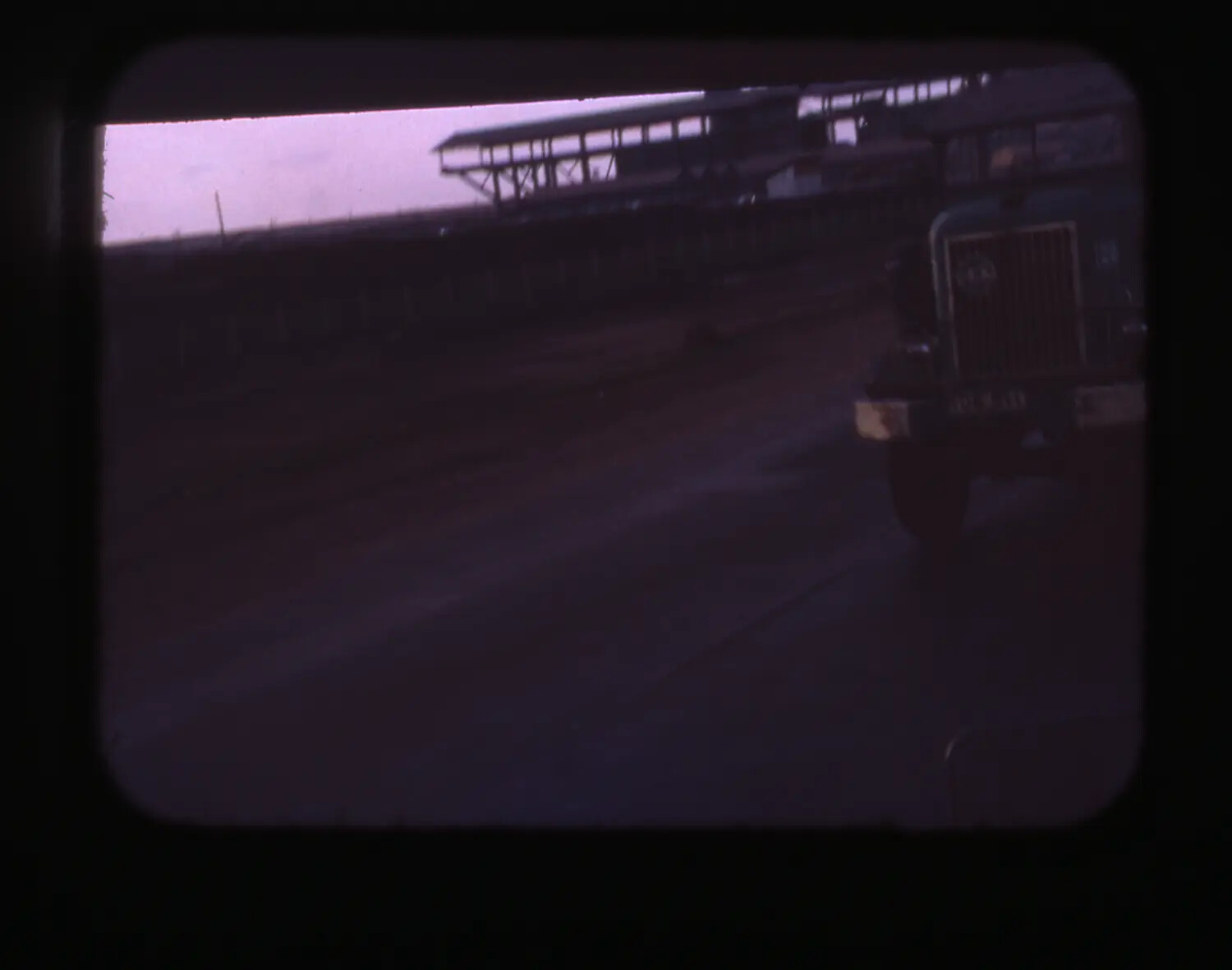 Truck and Elevated Conveyor Structure at Dusk, Cam Ranh Bay Port Area, Vietnam