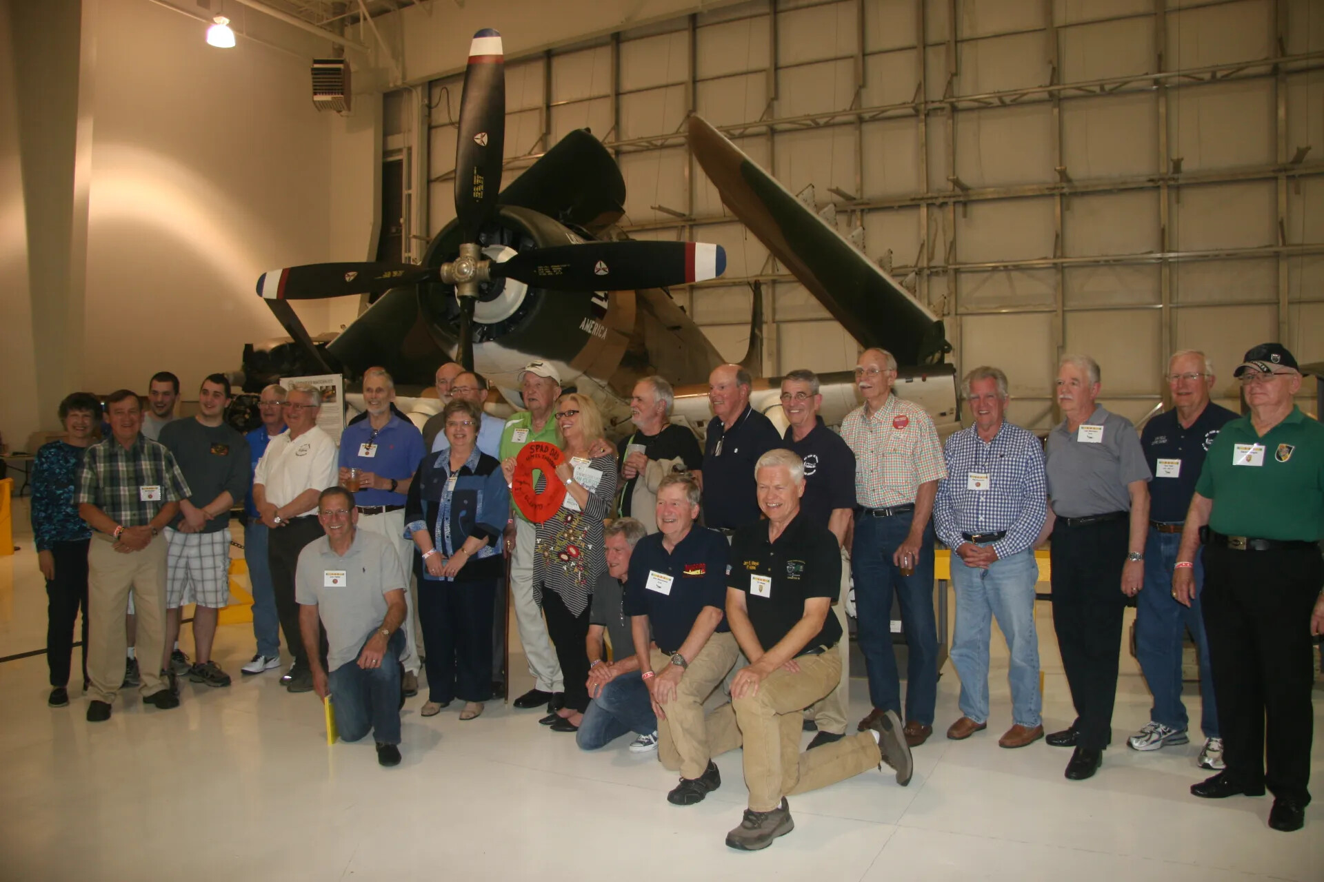 Group Photo Beneath A-1 Skyraider 'AMERICA', Additional Frame