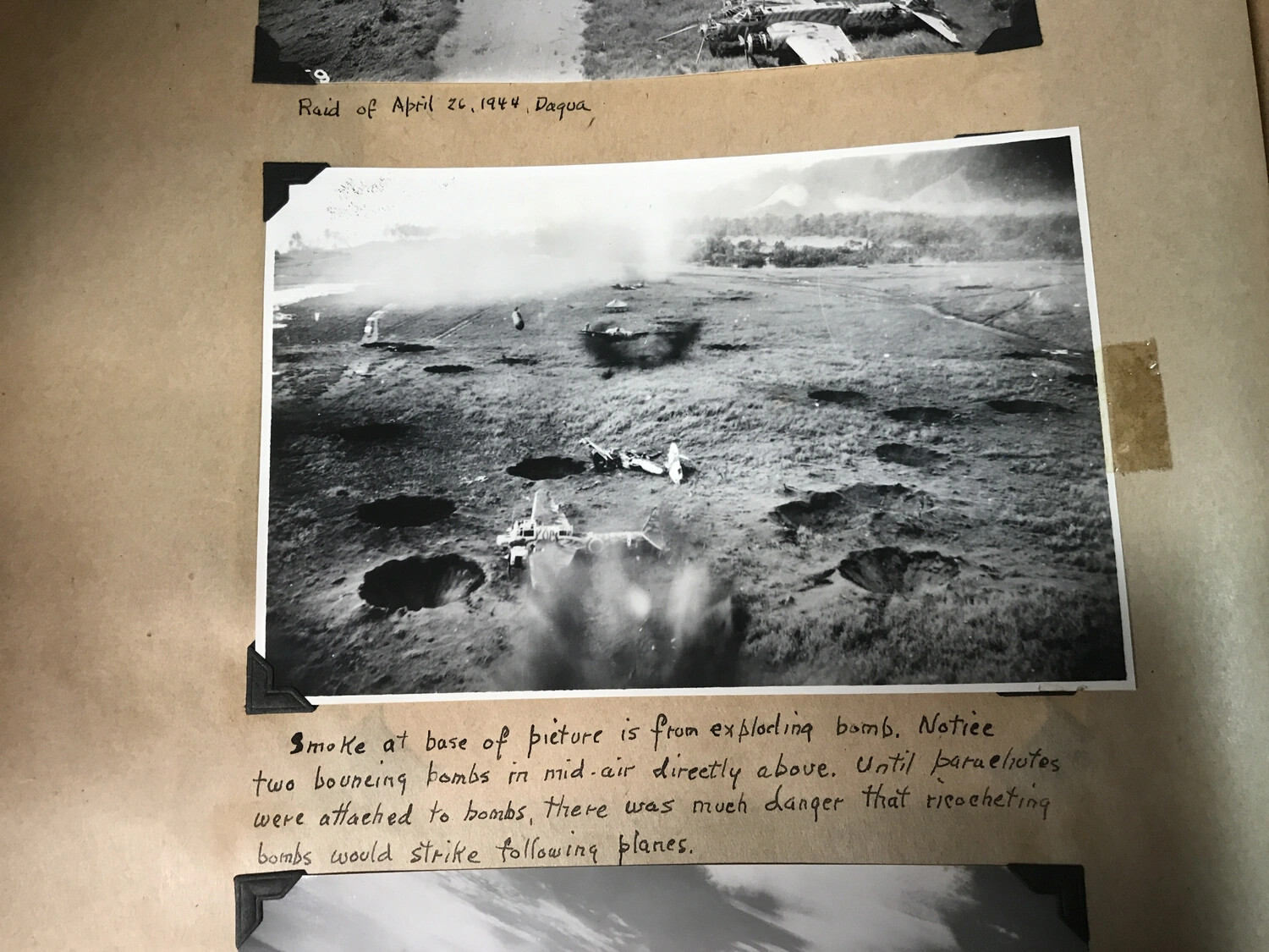Scrapbook Page: 'Raid of April 26, 1944, Dagua' -- Annotated Strike Photo with Parachute-Retarded Bombs