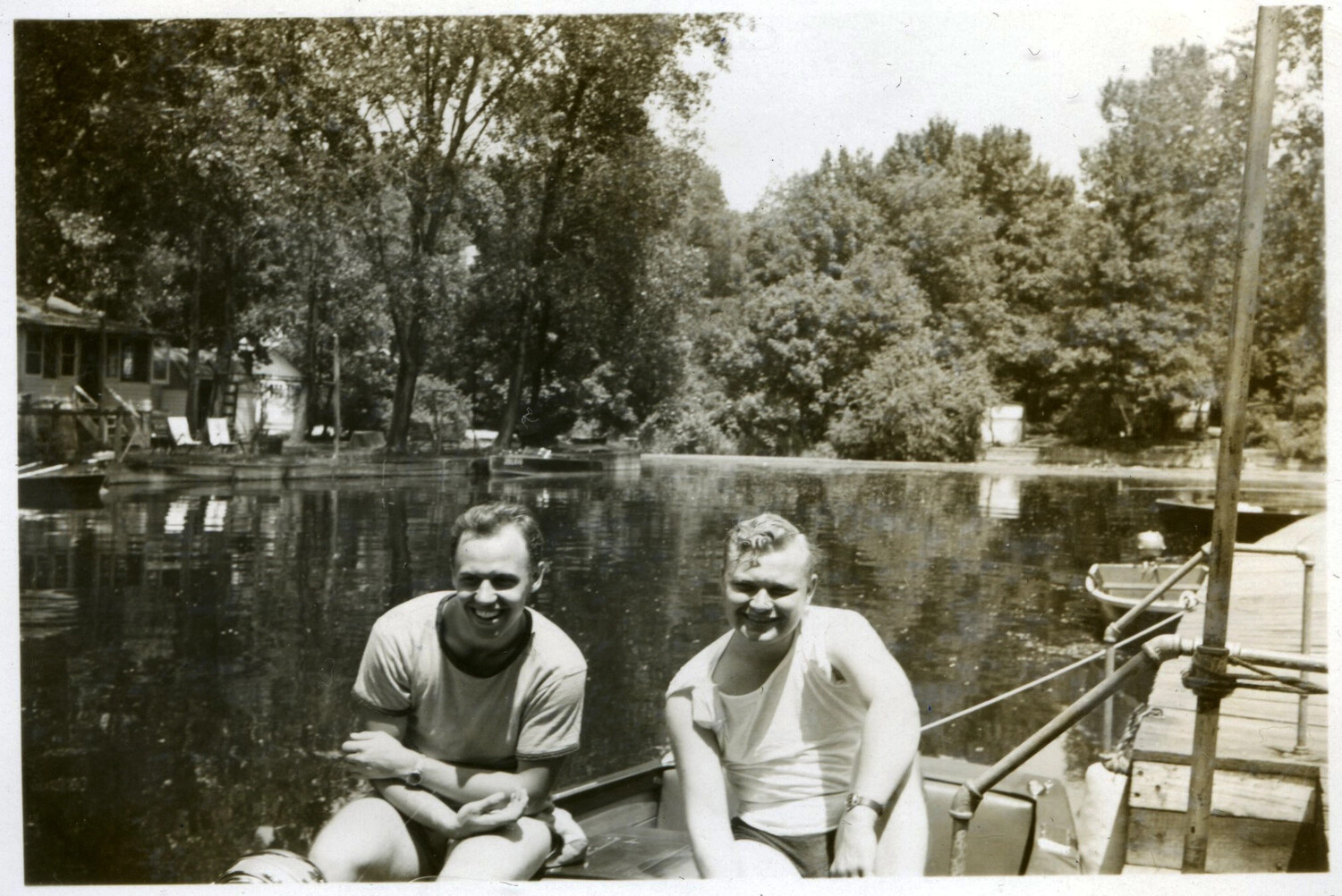 Snapshot: Two Men in a Motorboat on a Lake, Bancroft Collection, Korean War Era