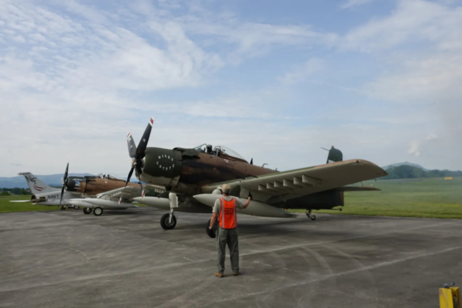 A-1 Skyraider 'Wiley Coyote' Marshalled on Ramp by Ground Crew, May 2019