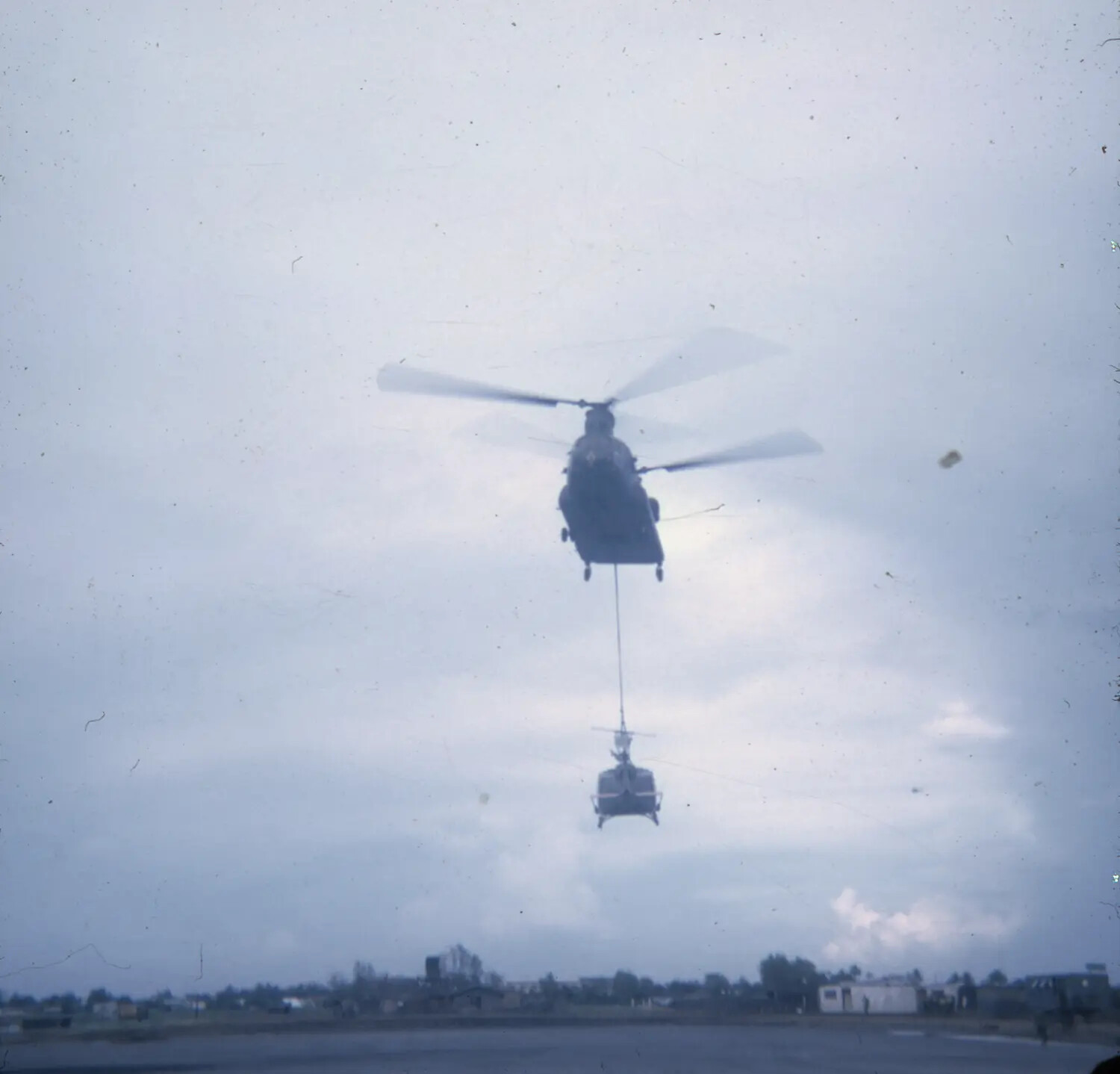 CH-47 Chinook Sling-Loading a UH-1 Huey Helicopter, Vietnam