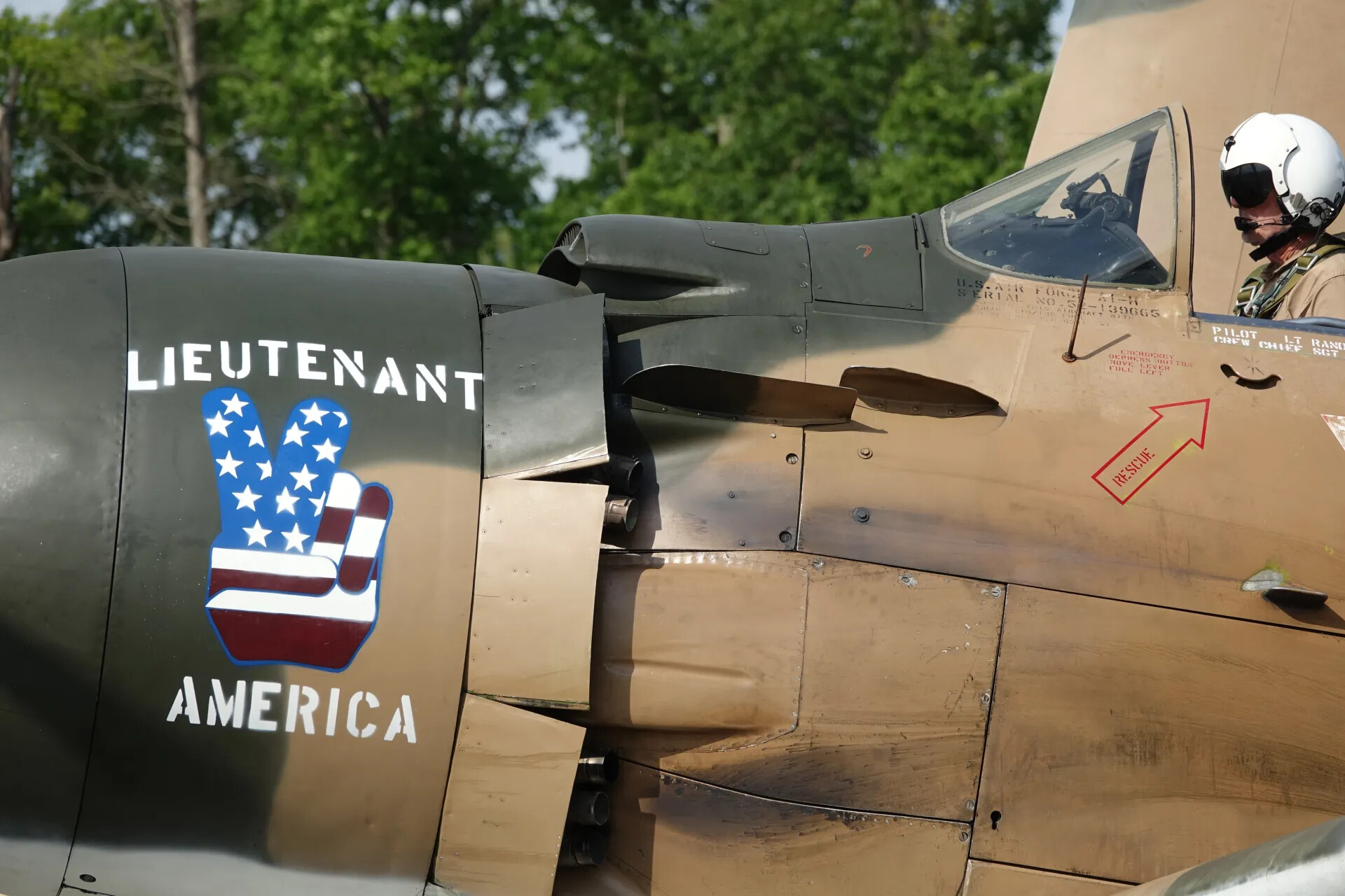 Nose Art 'Lieutenant America' on Douglas A-1H Skyraider with Pilot in Cockpit