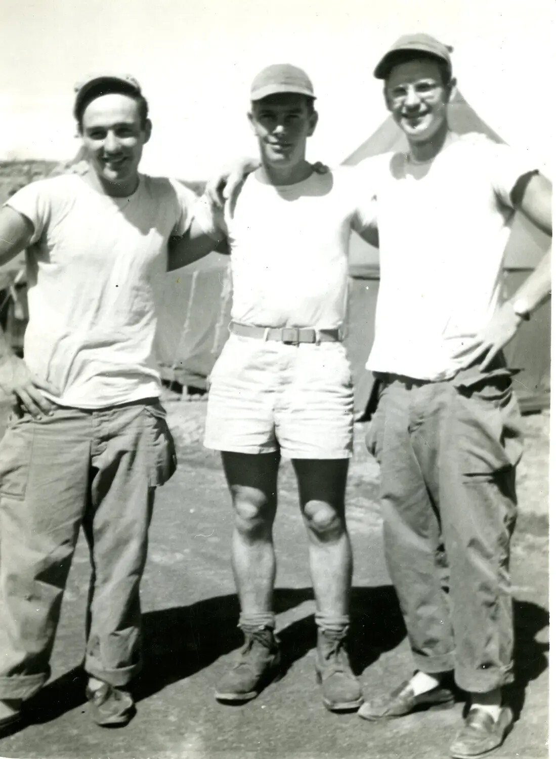 Three Marines Posing Arm-in-Arm at Camp, Pacific Theater, WWII