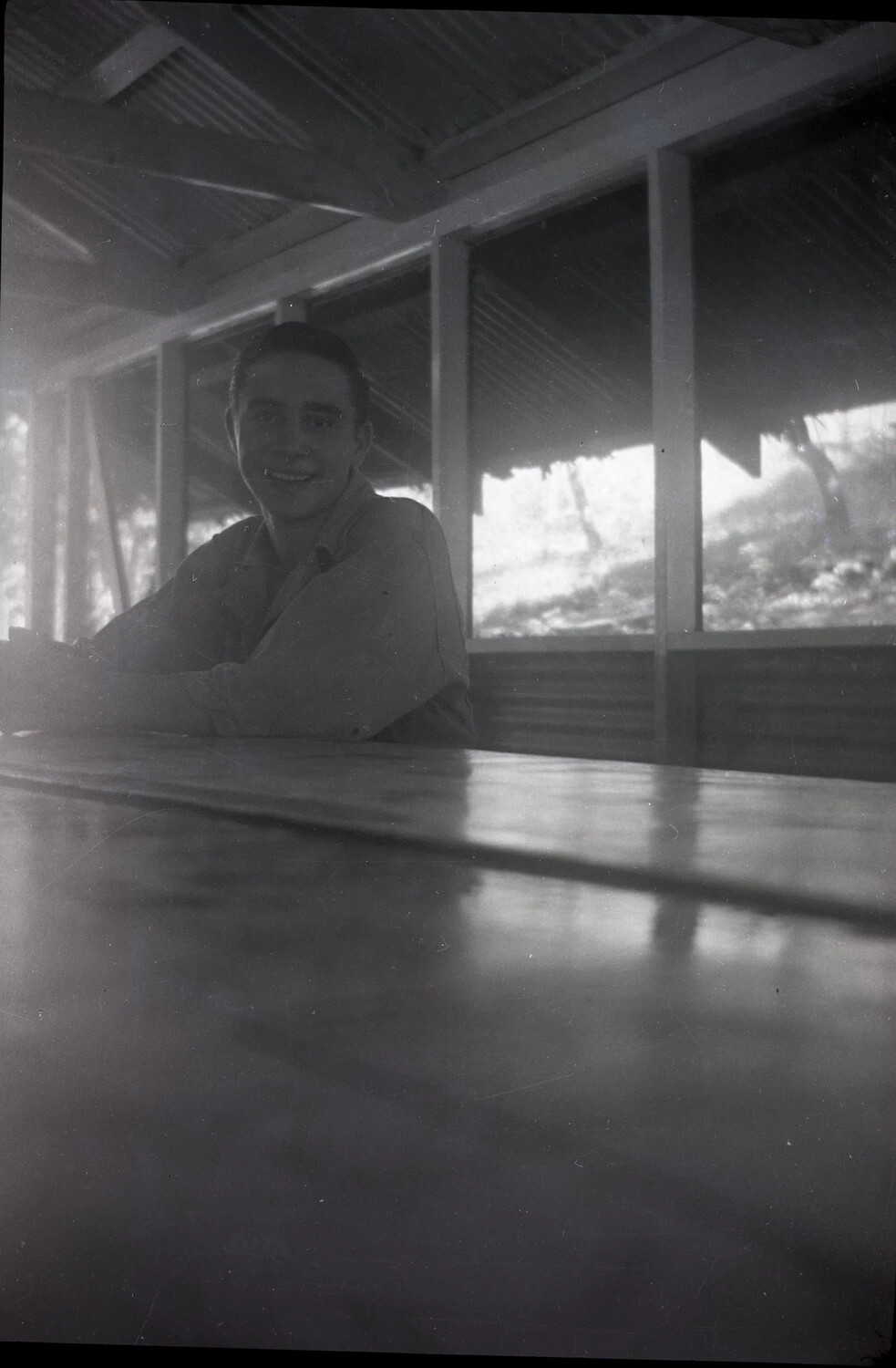 Serviceman Seated at Table in Open-Air Pavilion, Jack T. Kelley Album