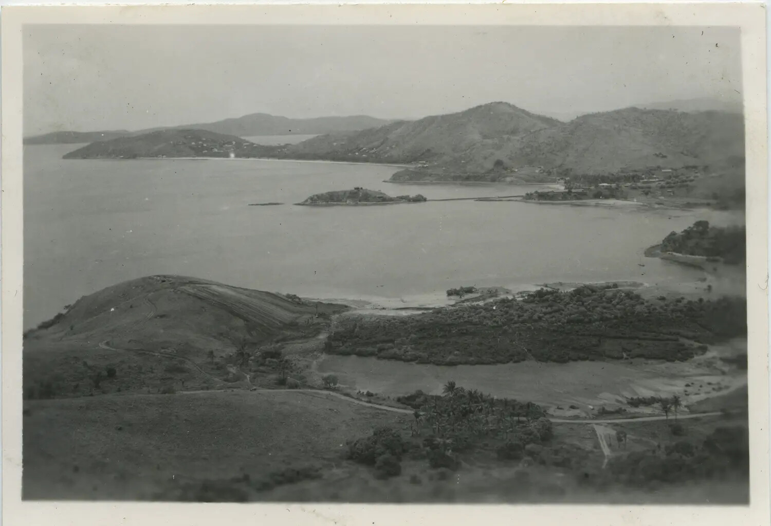 Panoramic View of a Pacific Island Bay and Coastal Settlement