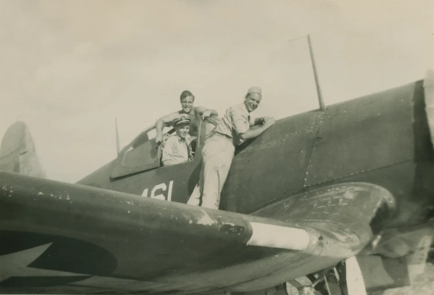 Three Servicemen Posed on Fighter Aircraft Cockpit, Early WWII Era - McAleer Collection
