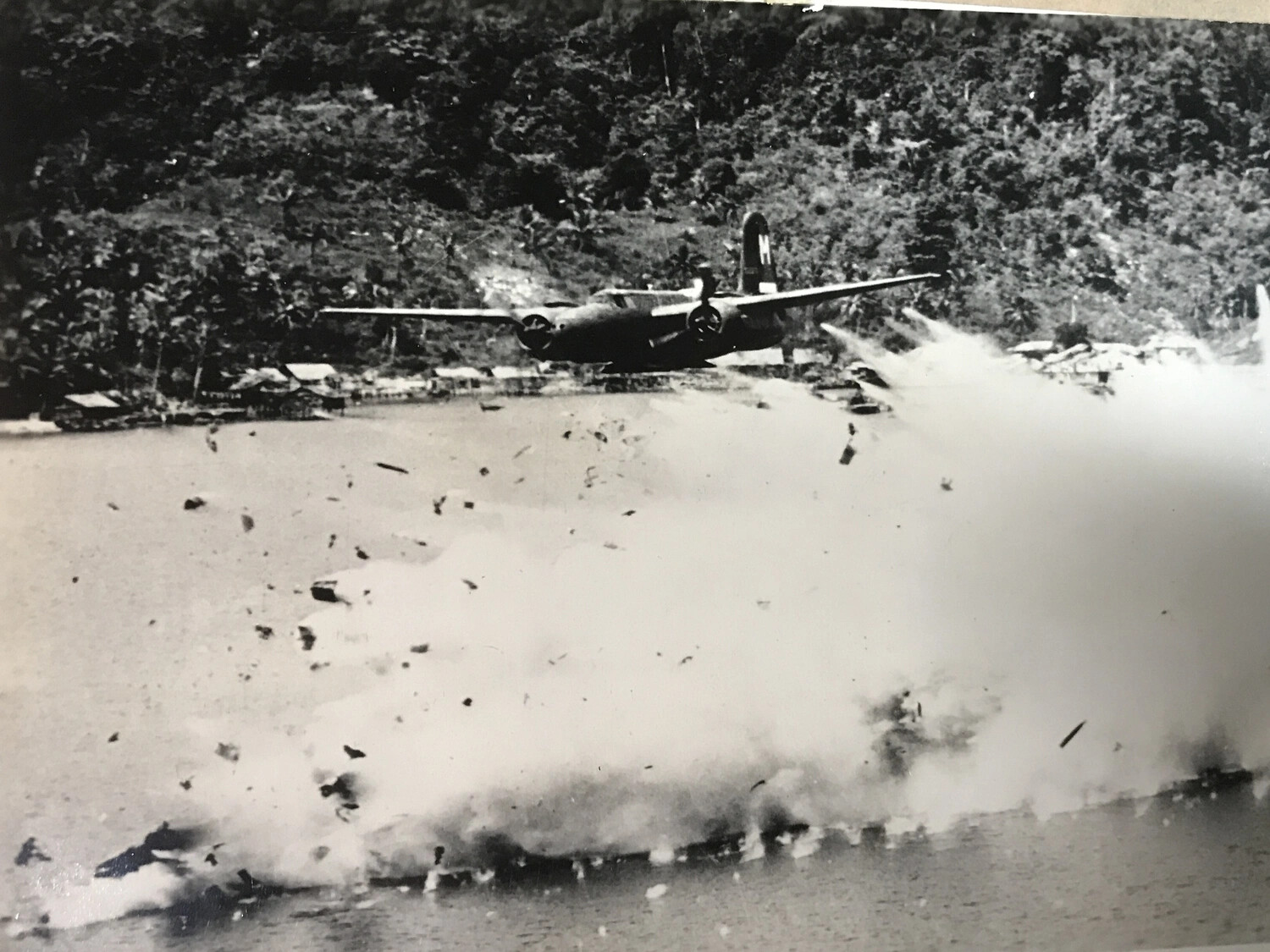 B-25 Mitchell Bomber Executing Low-Level Attack Run on Japanese Coastal Target