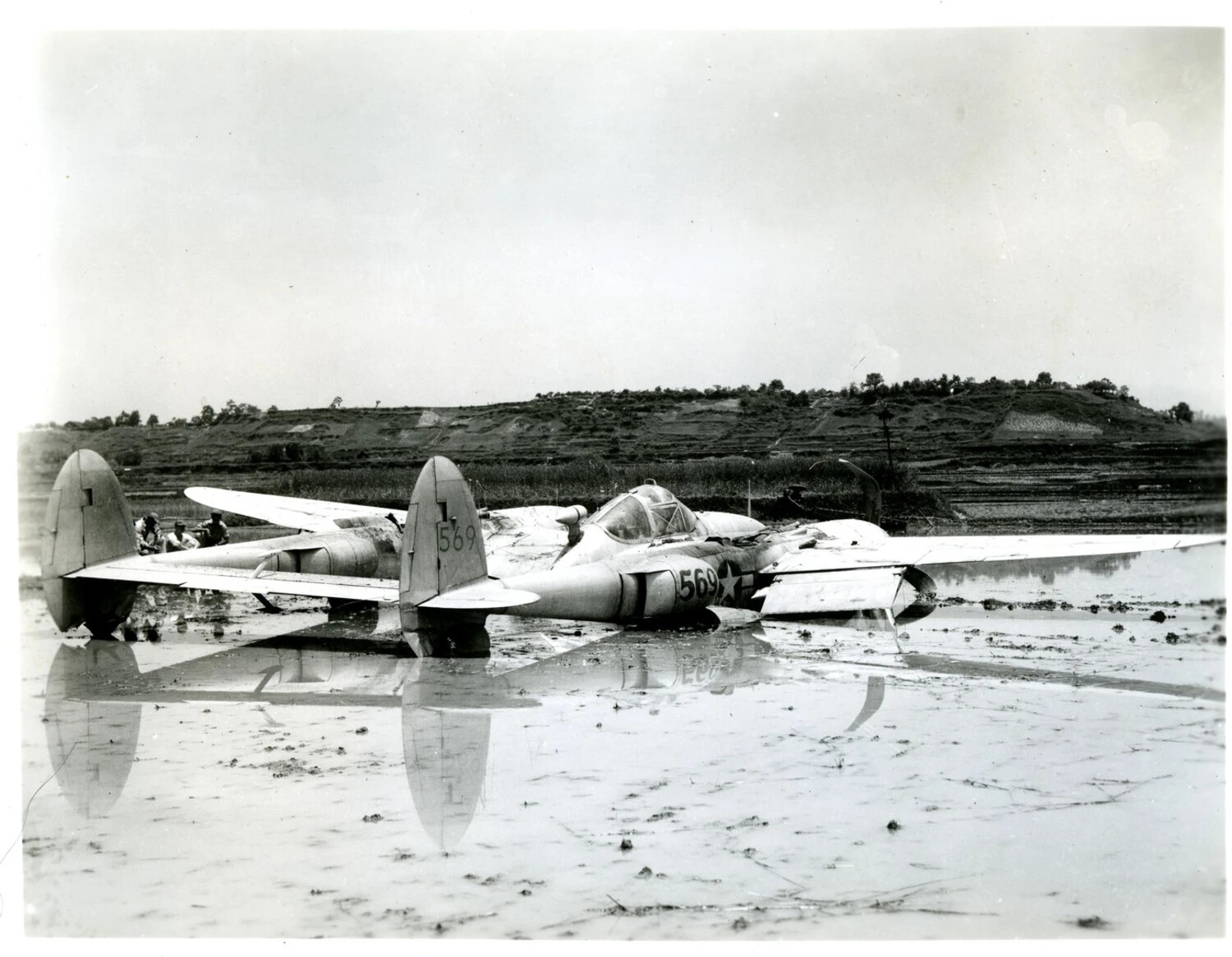 P-38 Lightning (Tail No. 569) After Belly Landing in Flooded Rice Paddy, CBI Theater, WWII