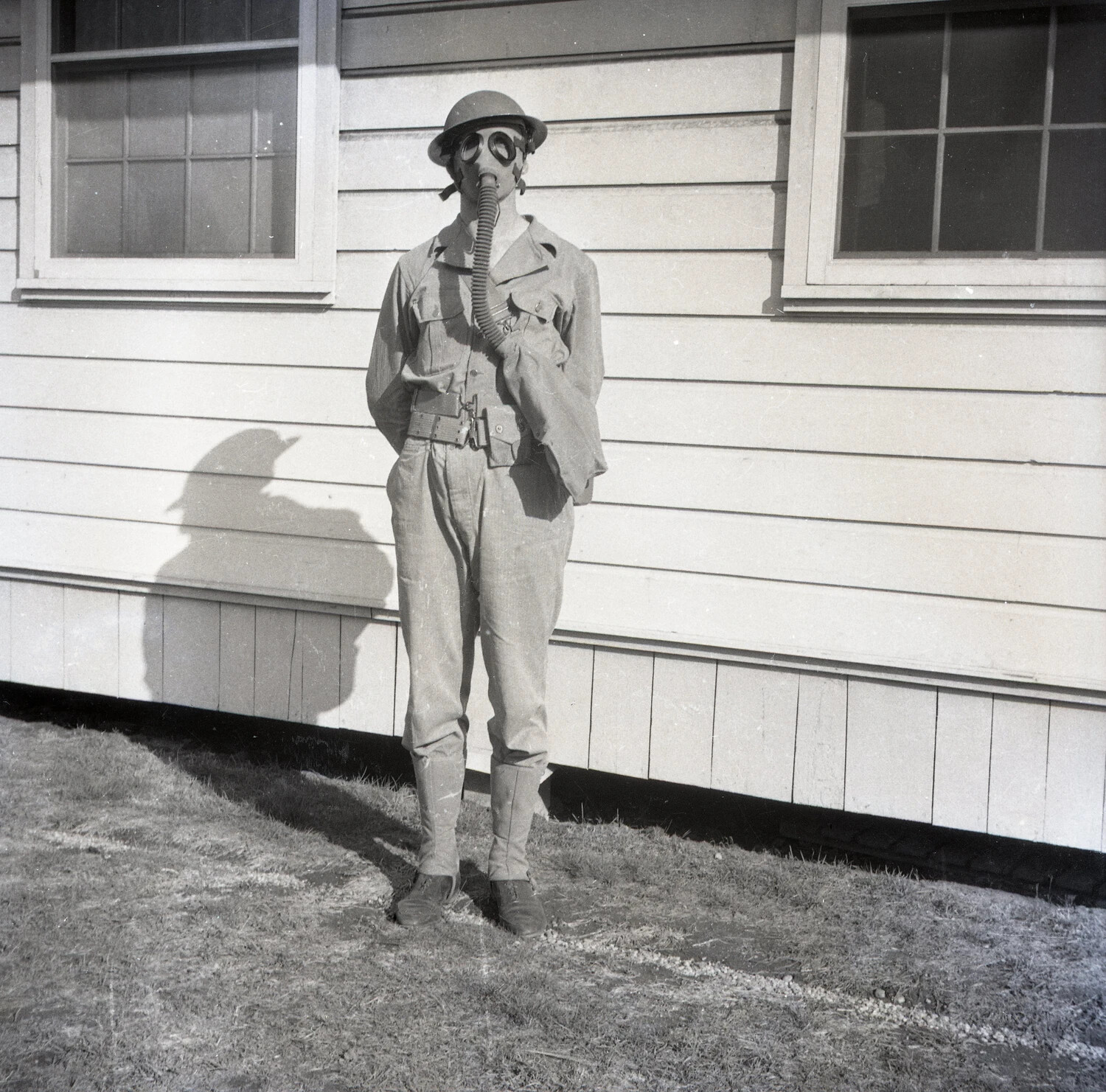 Serviceman in Gas Mask and Steel Helmet, Chemical Warfare Drill