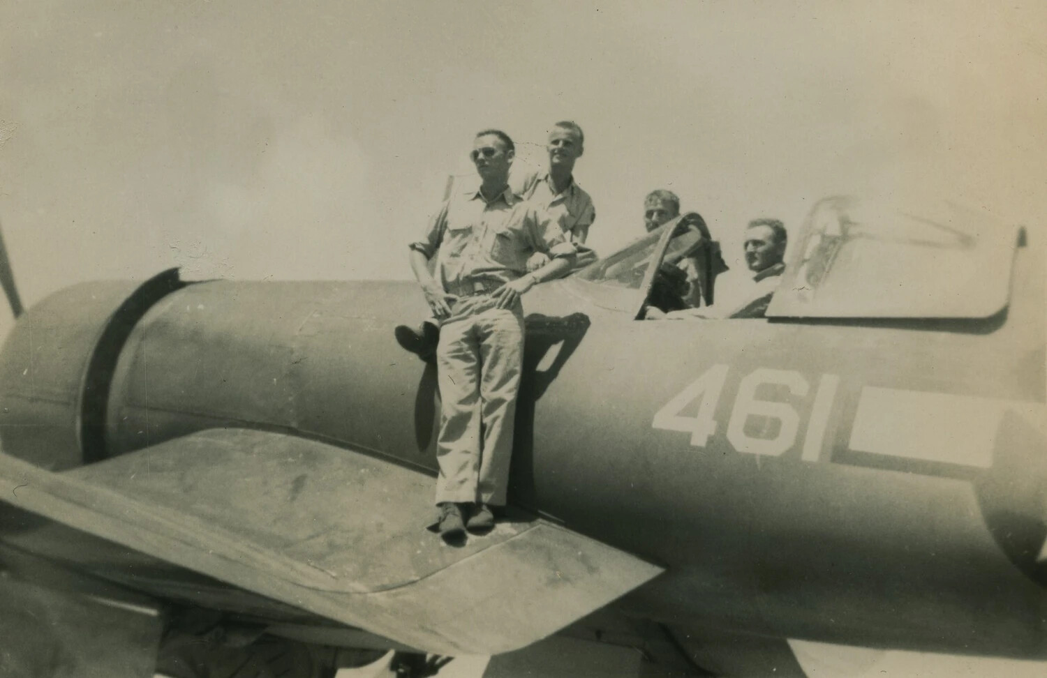 Airmen Posing on Training Aircraft No. 461, McAleer Family Album, WWII