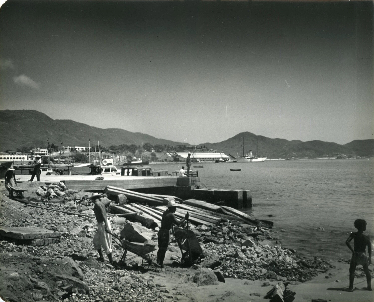 Harbor Construction Scene with Laborers and Anchored Vessel, Coastal Mexico, 1949