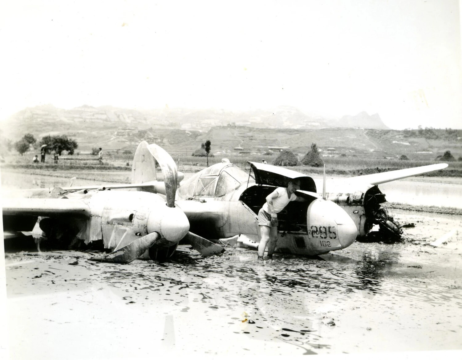 Crash-Landed P-38 Lightning in Flooded Rice Paddy, CBI Theater, WWII