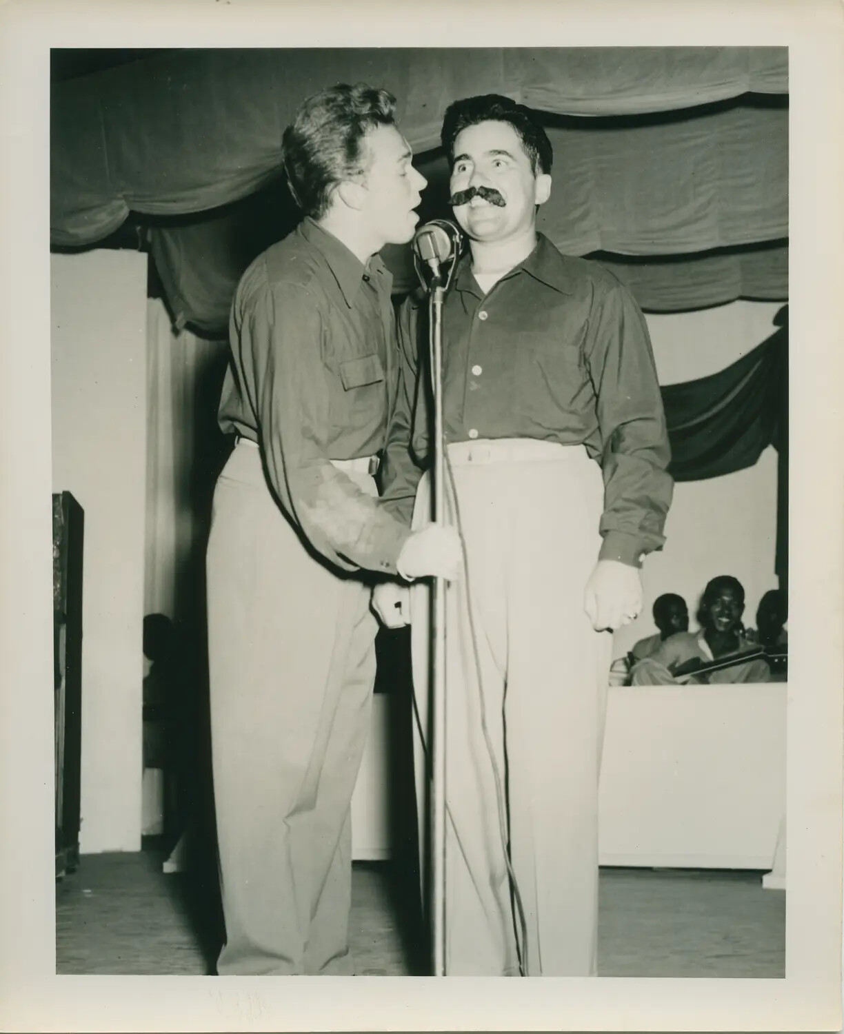 Sailors Performing Comic Duet at Shipboard Variety Show, USS Petrof Bay (CVE-80)