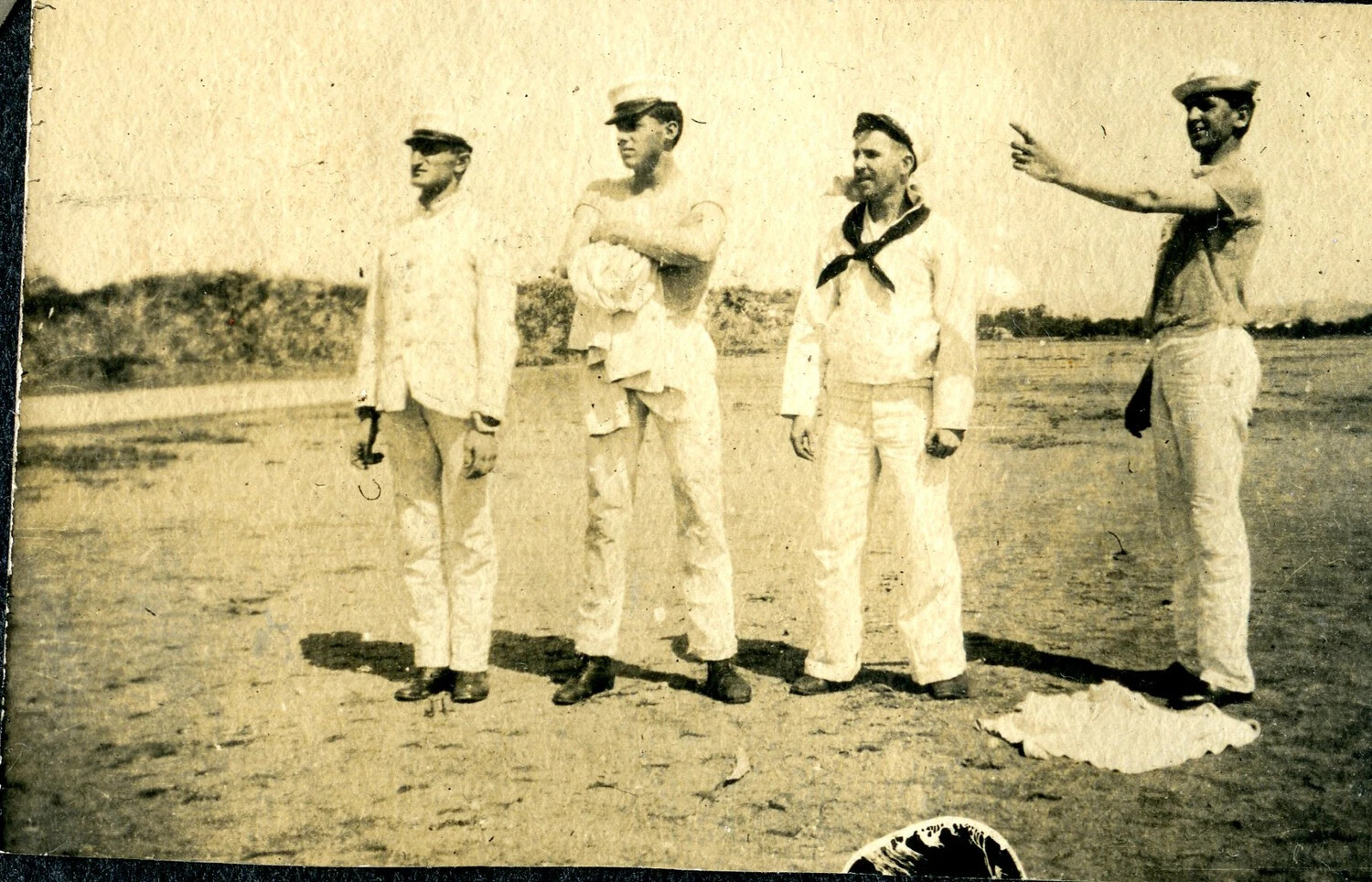 Four Sailors on a Beach During Shore Liberty, USS Columbia Album, c. 1900s