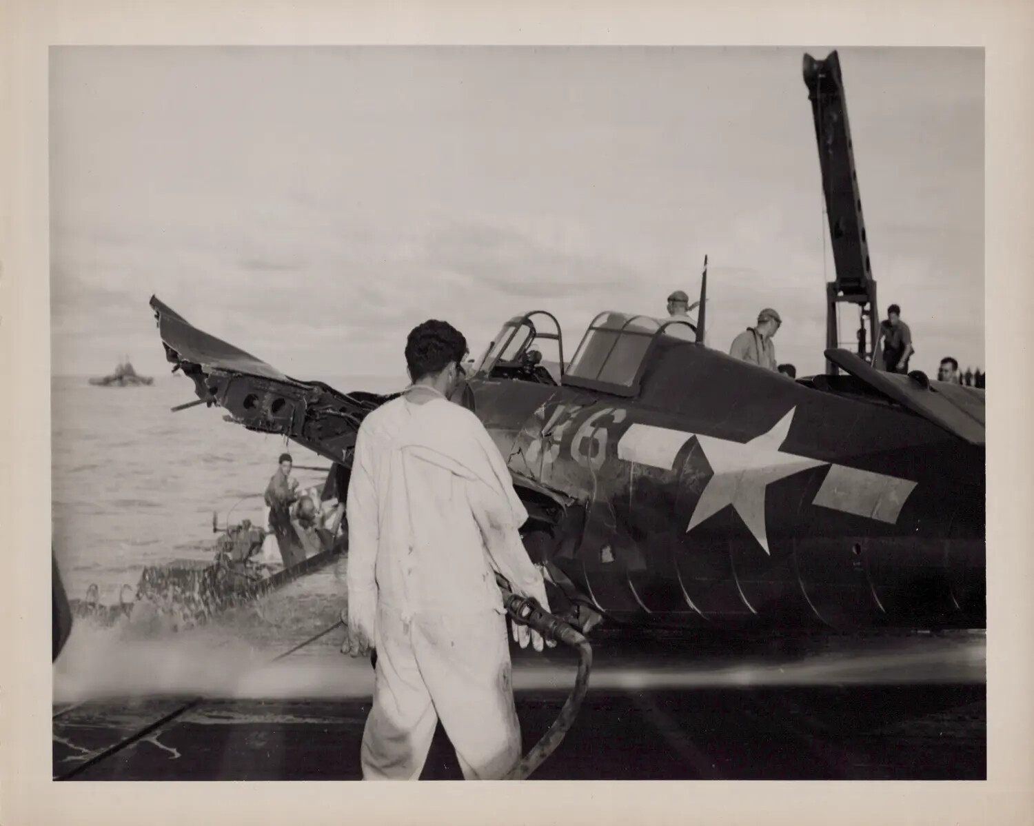 Fire Hose Crew Dousing Crash-Damaged Aircraft, Escort Carrier Flight Deck, WWII