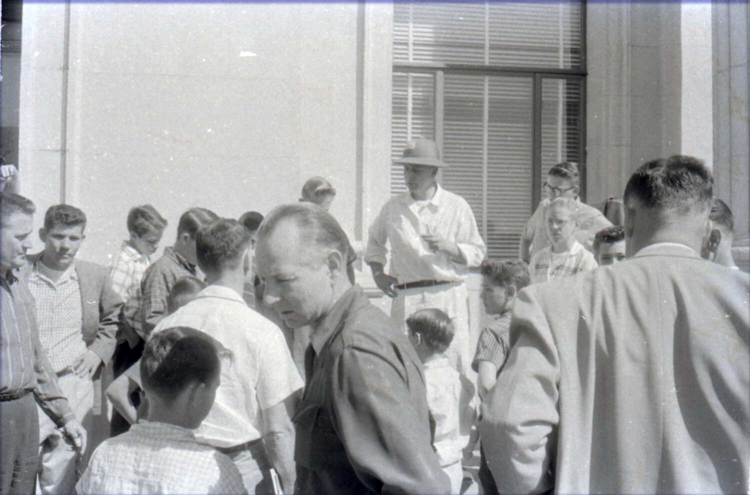 Group of Boys and Men Gathered Outside Civic Building, Likely Soap Box Derby Event, c. 1950s