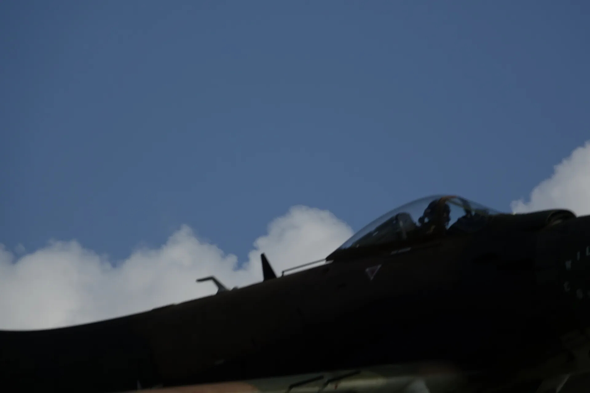 Silhouette of Jet Fighter Cockpit Against Sky, 2019 Event