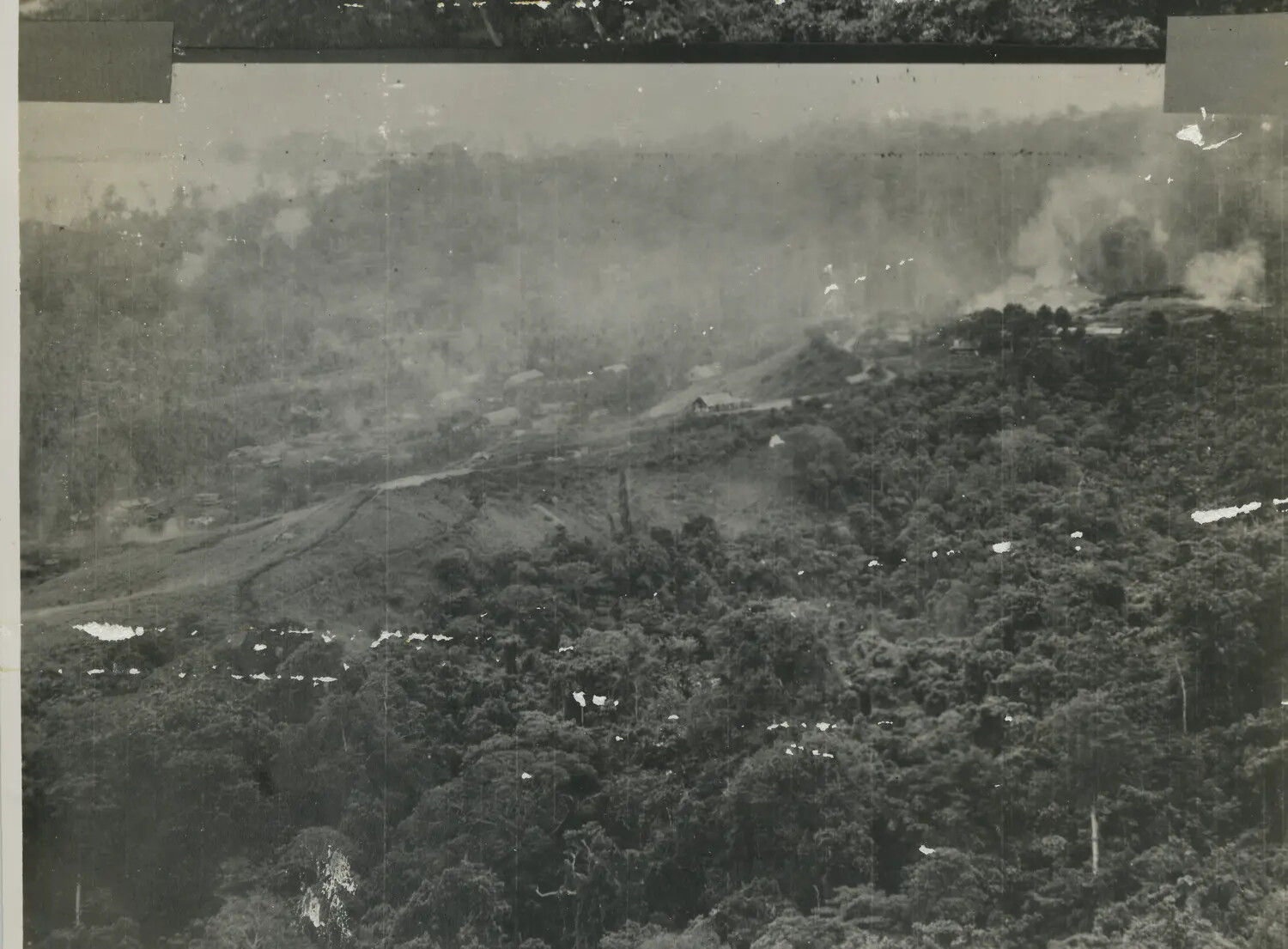 Wide-Area Aerial Strike Photograph, Valley Target with Multiple Explosions, 312th Bomb Group, WWII Pacific Theater