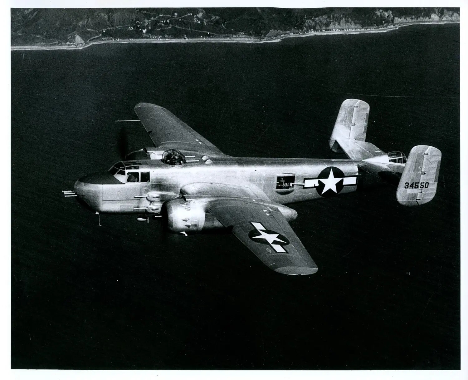 North American B-25 Mitchell Medium Bomber in Flight Over Coastline, Serial No. 34550