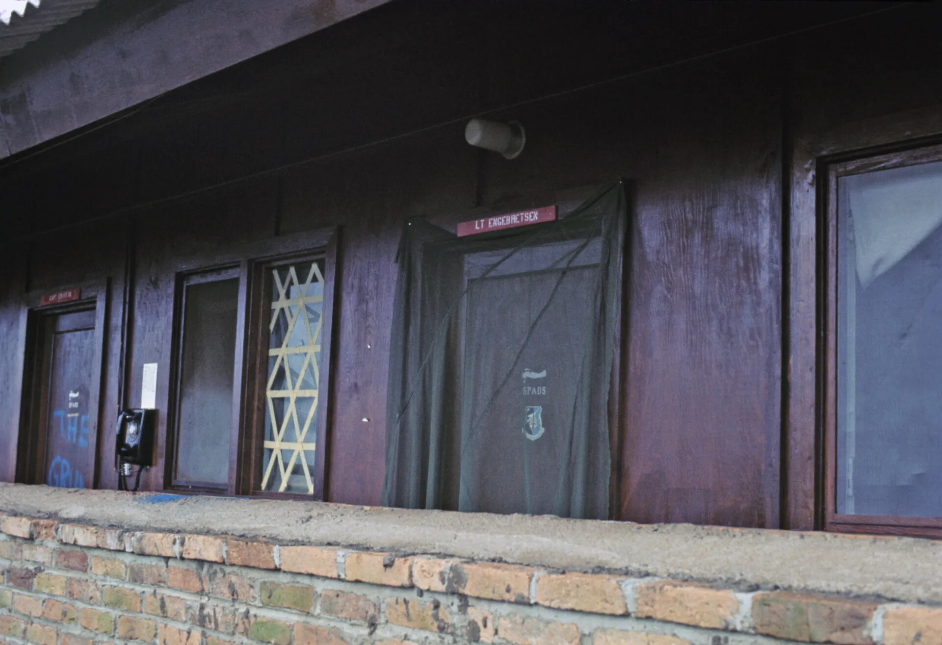 Squadron Billeting Building Exterior with Lt. Engebretsen's Door and SPADS Emblem, 1969