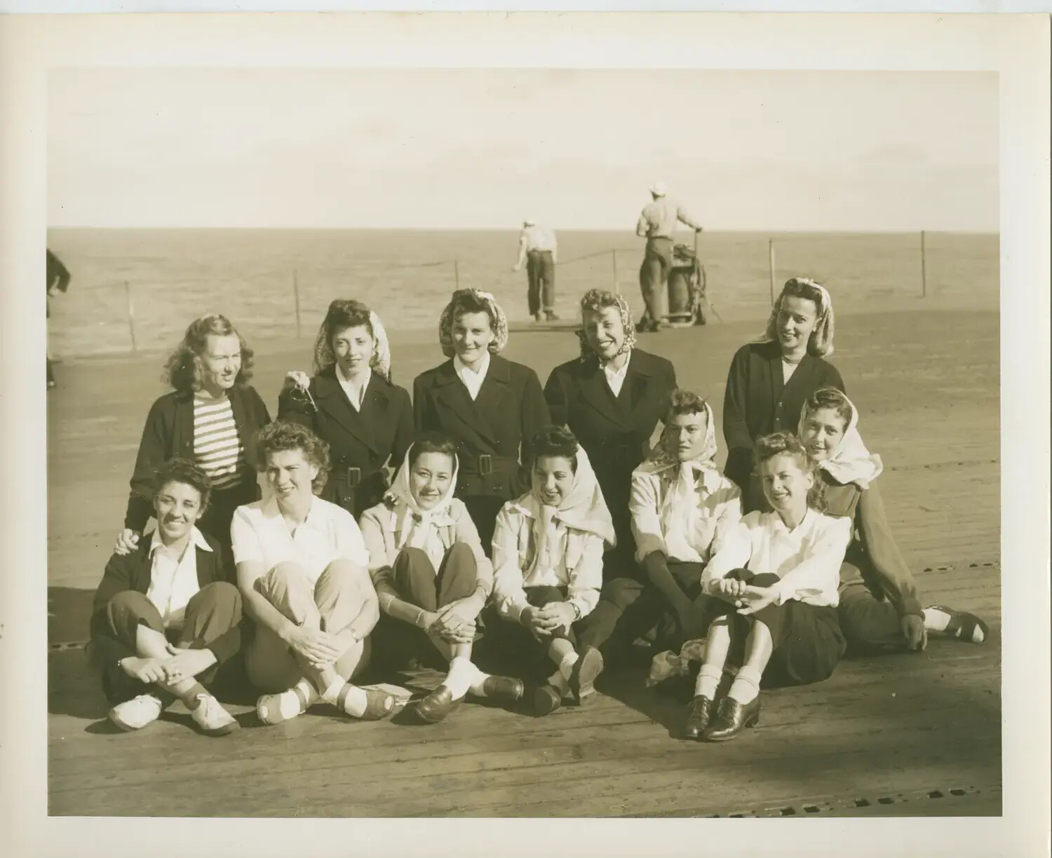 Group Portrait of Civilian Women on Flight Deck, USS Petrof Bay (CVE-80), WWII Era