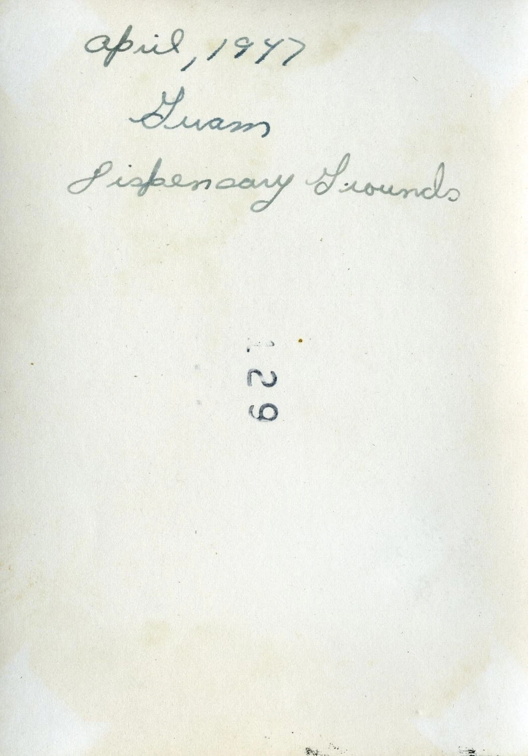 Album Caption Page: 'Guam, Dispensary Grounds,' April 1947 - VR-6 Agana, Guam Photo Album