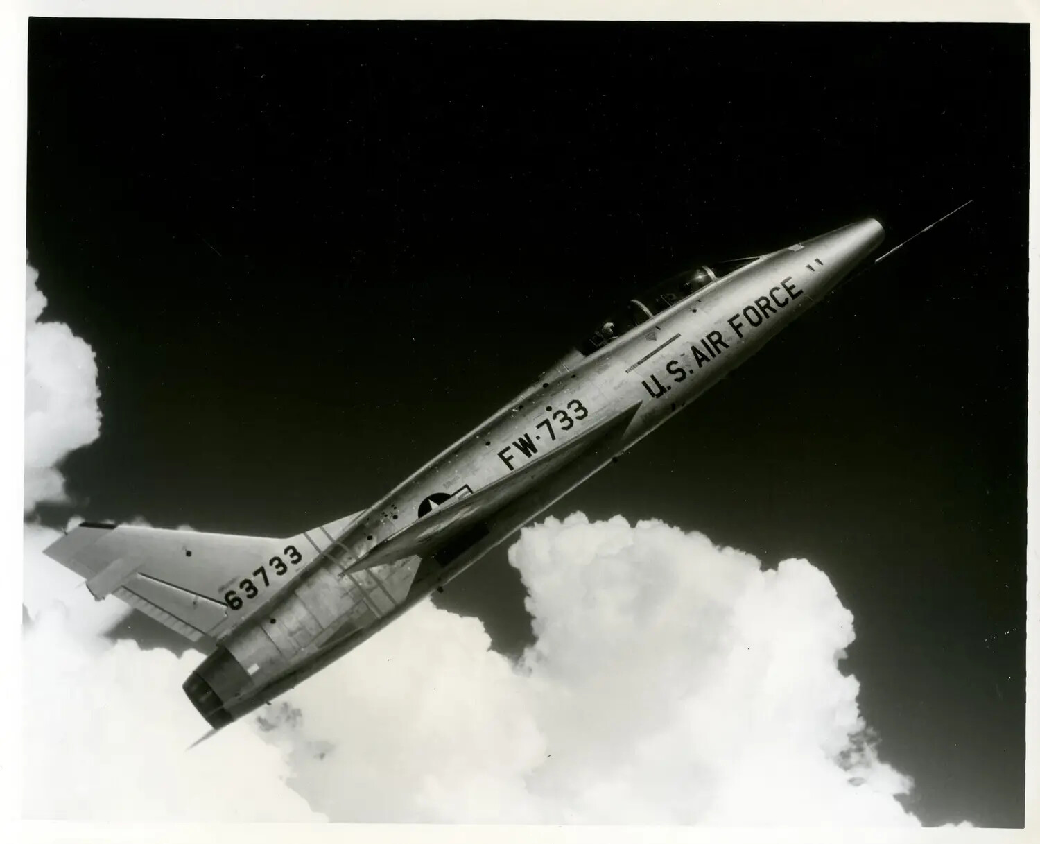 North American F-100 Super Sabre 'FW-733' in Climbing Flight, USAF Publicity Photograph
