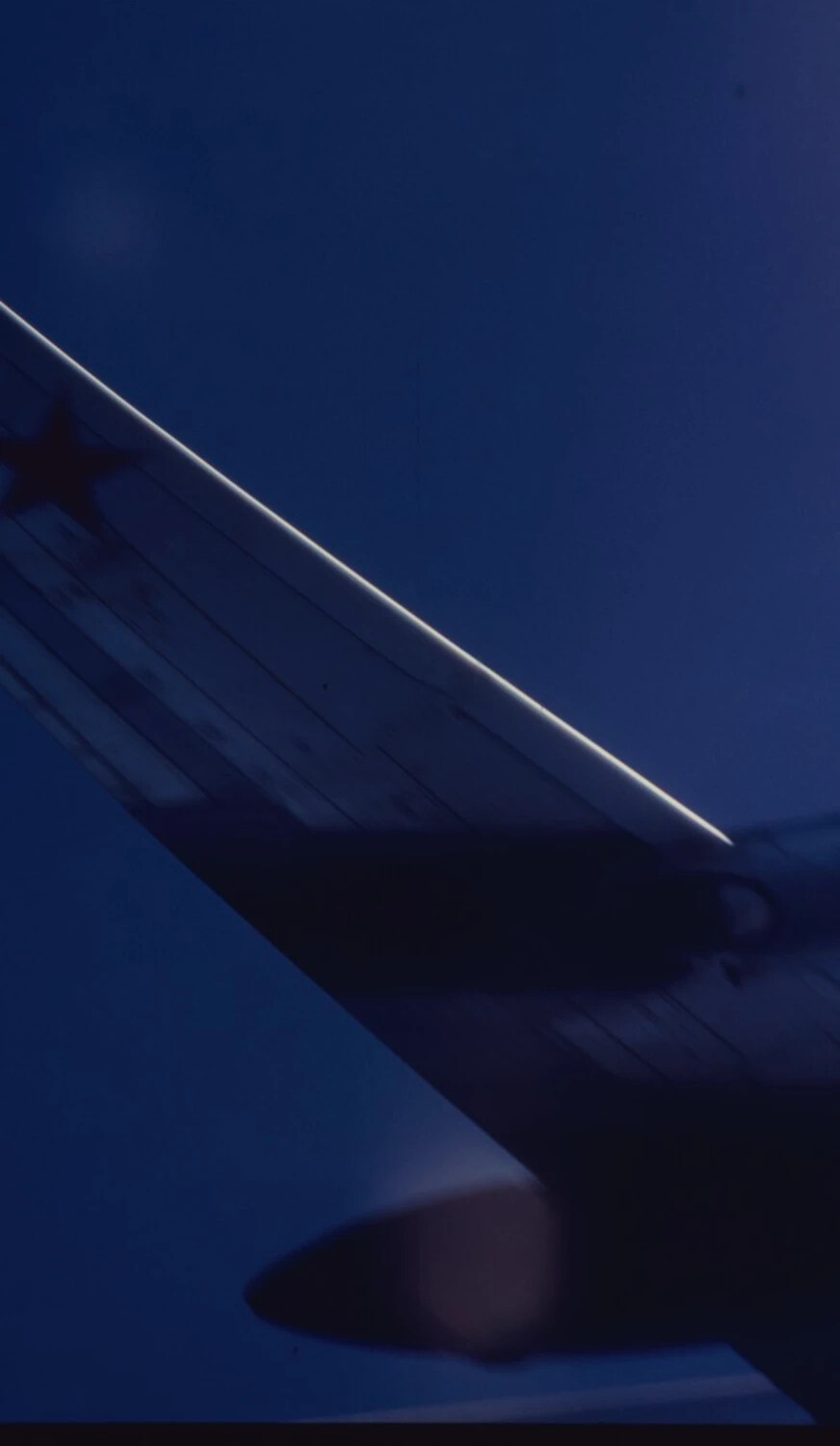 Twilight Air-to-Air View of A-1 Skyraider Wing with National Star Insignia, Vietnam War Era