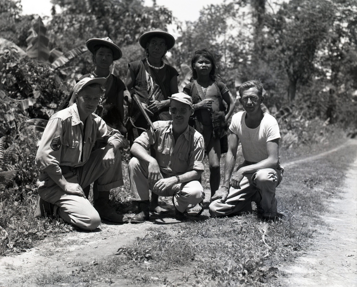 American Servicemen Posing with Local Tribesmen near Dinjan, Assam, India, World War II