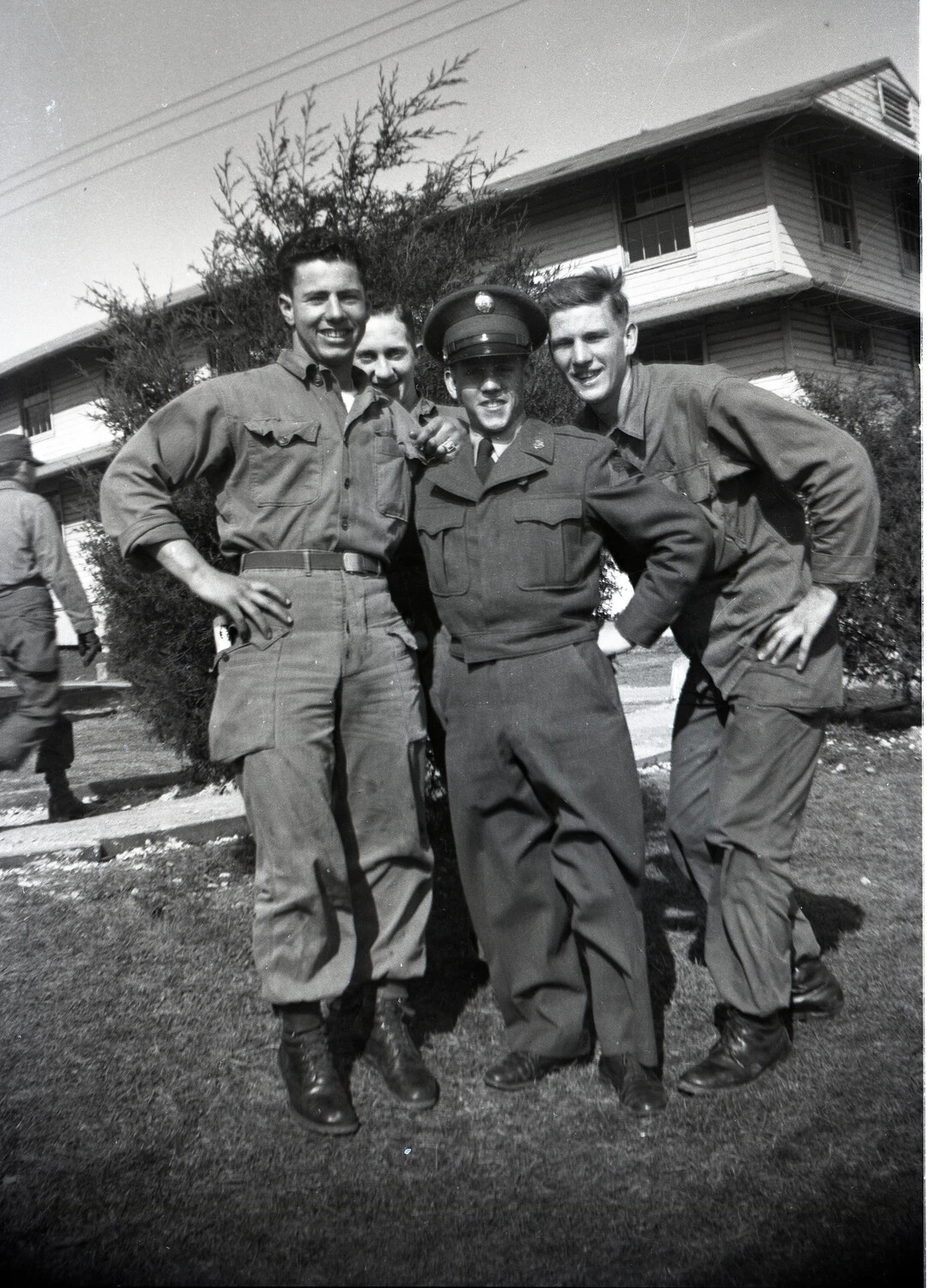 Group Portrait of Airmen and a Young Woman at Randolph Field Barracks
