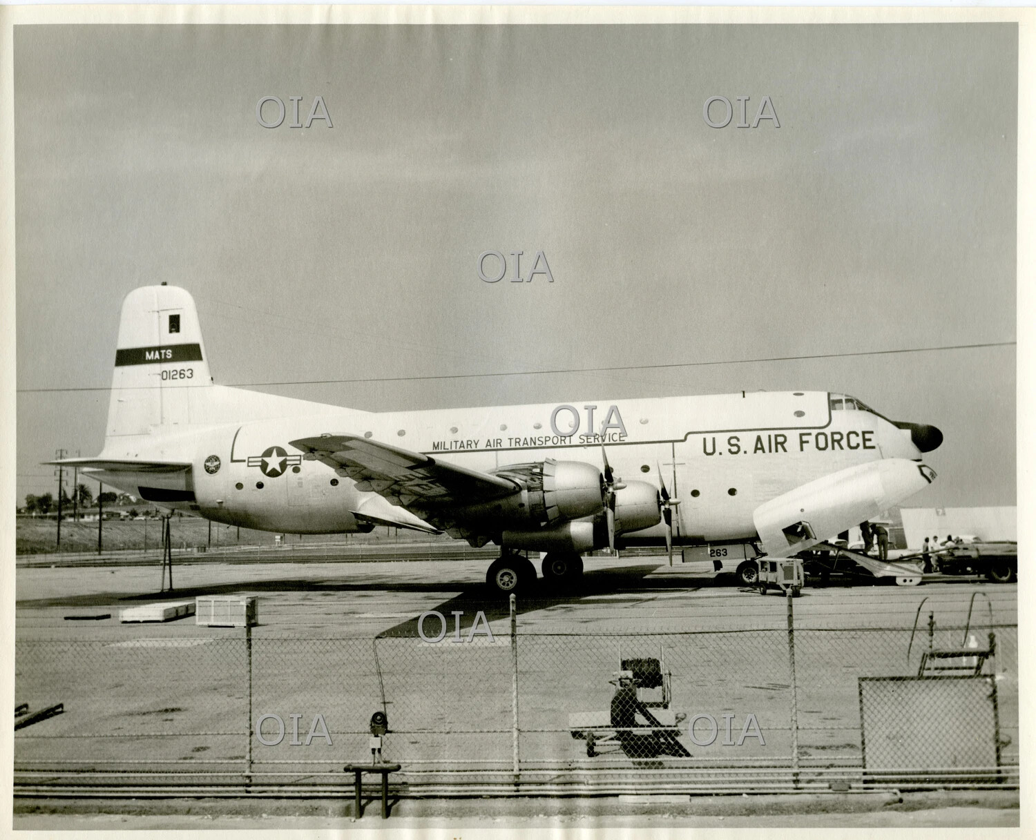 U.S. Air Force Military Air Transport Service (MATS) Four-Engine Transport Aircraft, Tail No. 01263, on Airfield Ramp