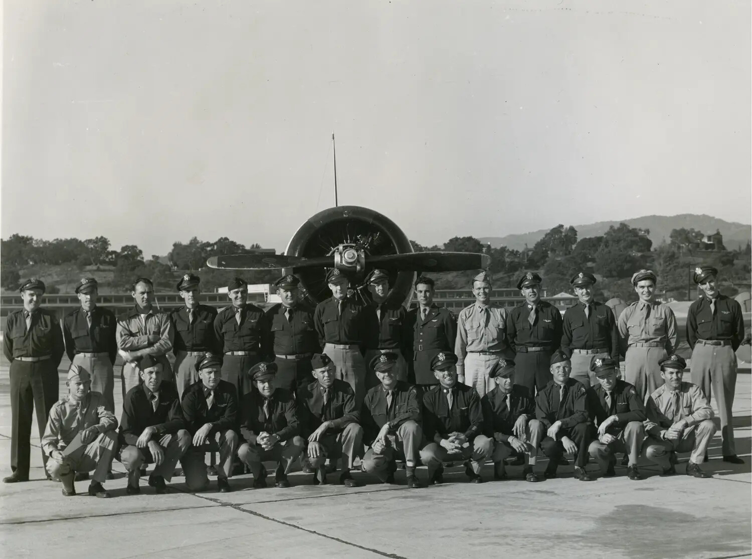 U.S. Army Air Forces Squadron Group Portrait in Front of Radial-Engine Aircraft, WWII China-Burma-India Theater Archive