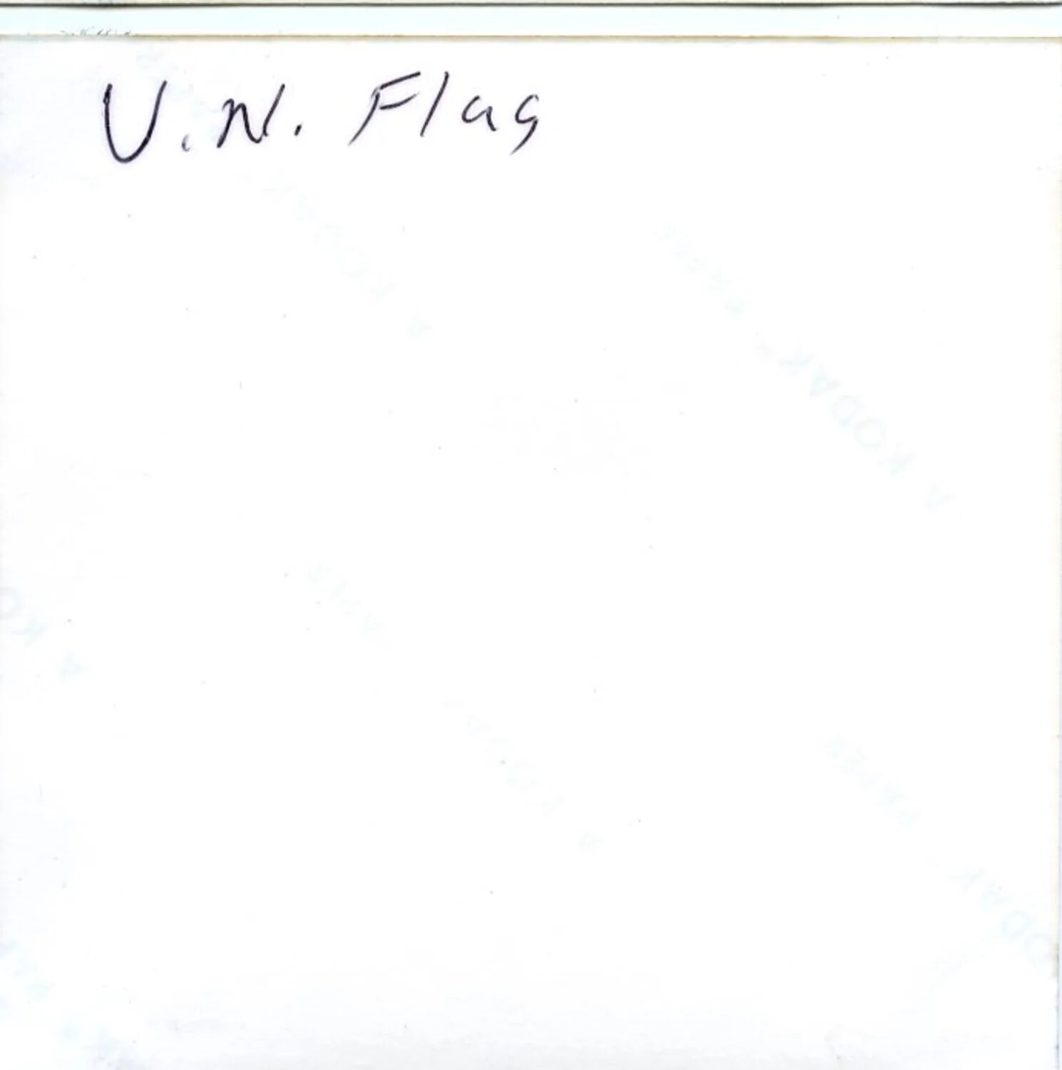 Handwritten Caption Card: 'U.N. Flag' — Vietnam Photo Album, 1971