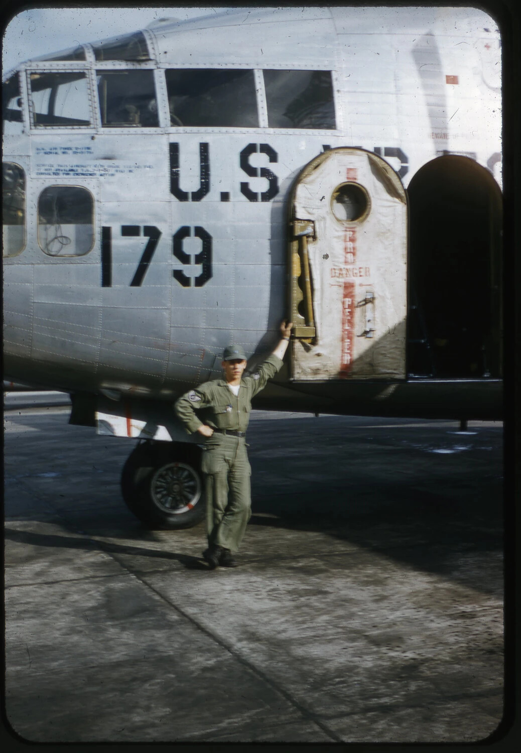 U.S. Military Serviceman Posing Beside Transport Aircraft No. 179 (Glenn Haidet Collection)