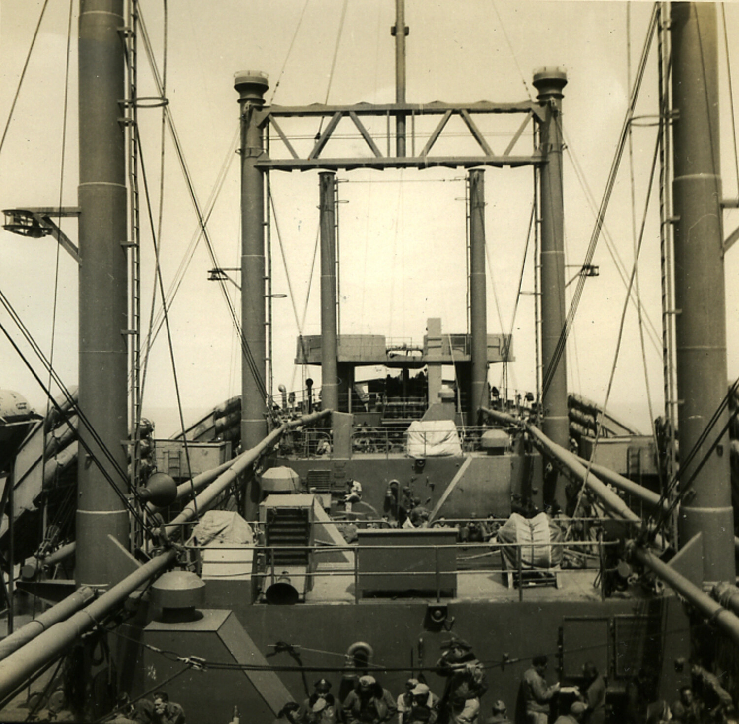 Midships View of Rigging and Deck Structures Aboard a WWII-Era Transport Ship, Postwar Pacific Crossing