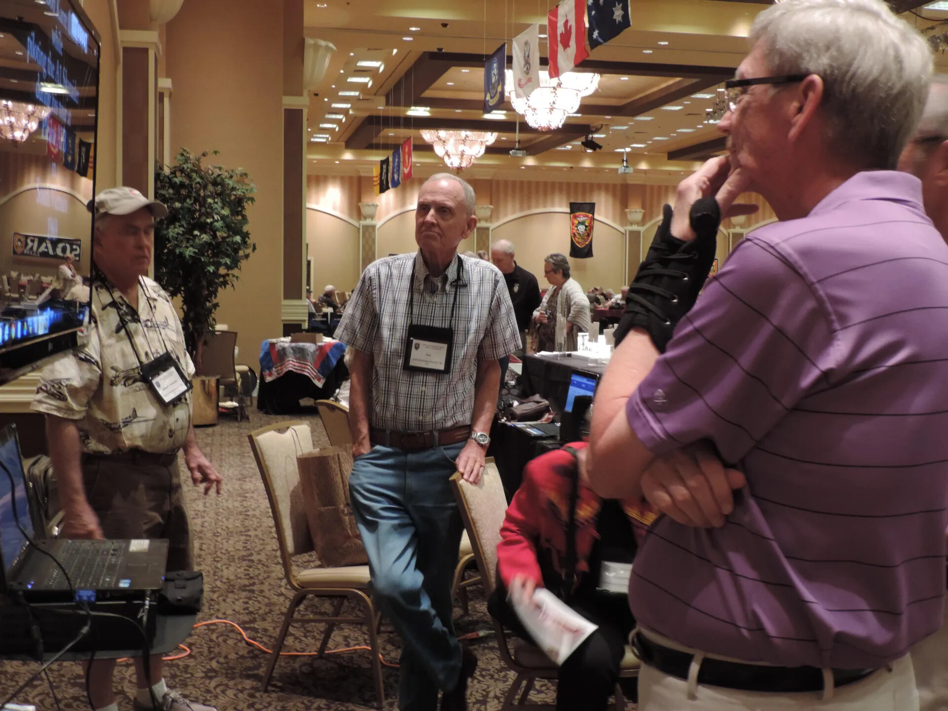 Members Conversing in the Main Hall Beneath the Ceiling Flags, Special Operations Association Reunion, Las Vegas, 2013