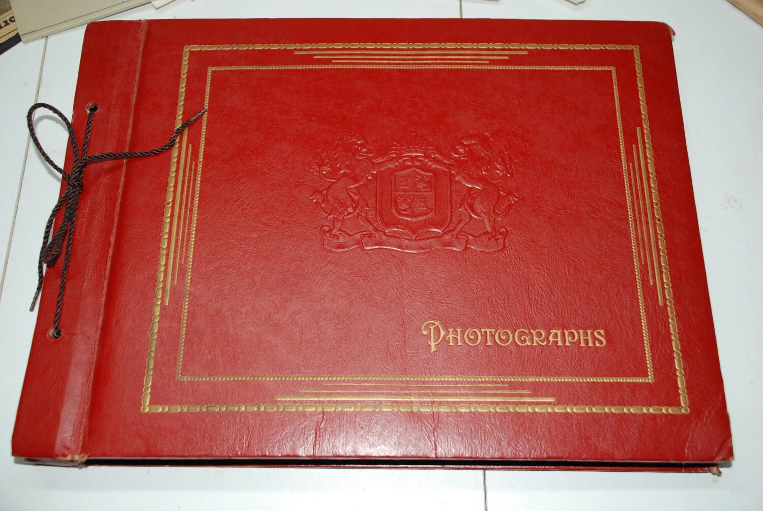 Cover of Red Leatherette 'Photographs' Album, Jack T. Kelley Collection