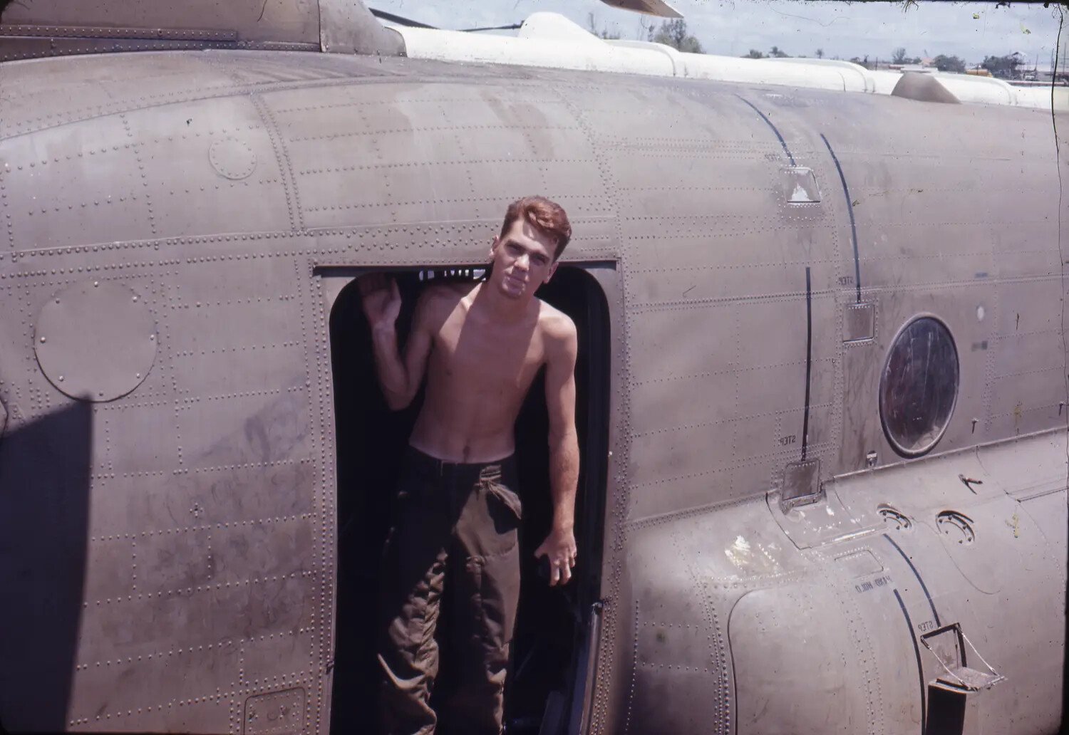 Serviceman in Aircraft Cargo Door, Vietnam War Era (35mm Color Slide)