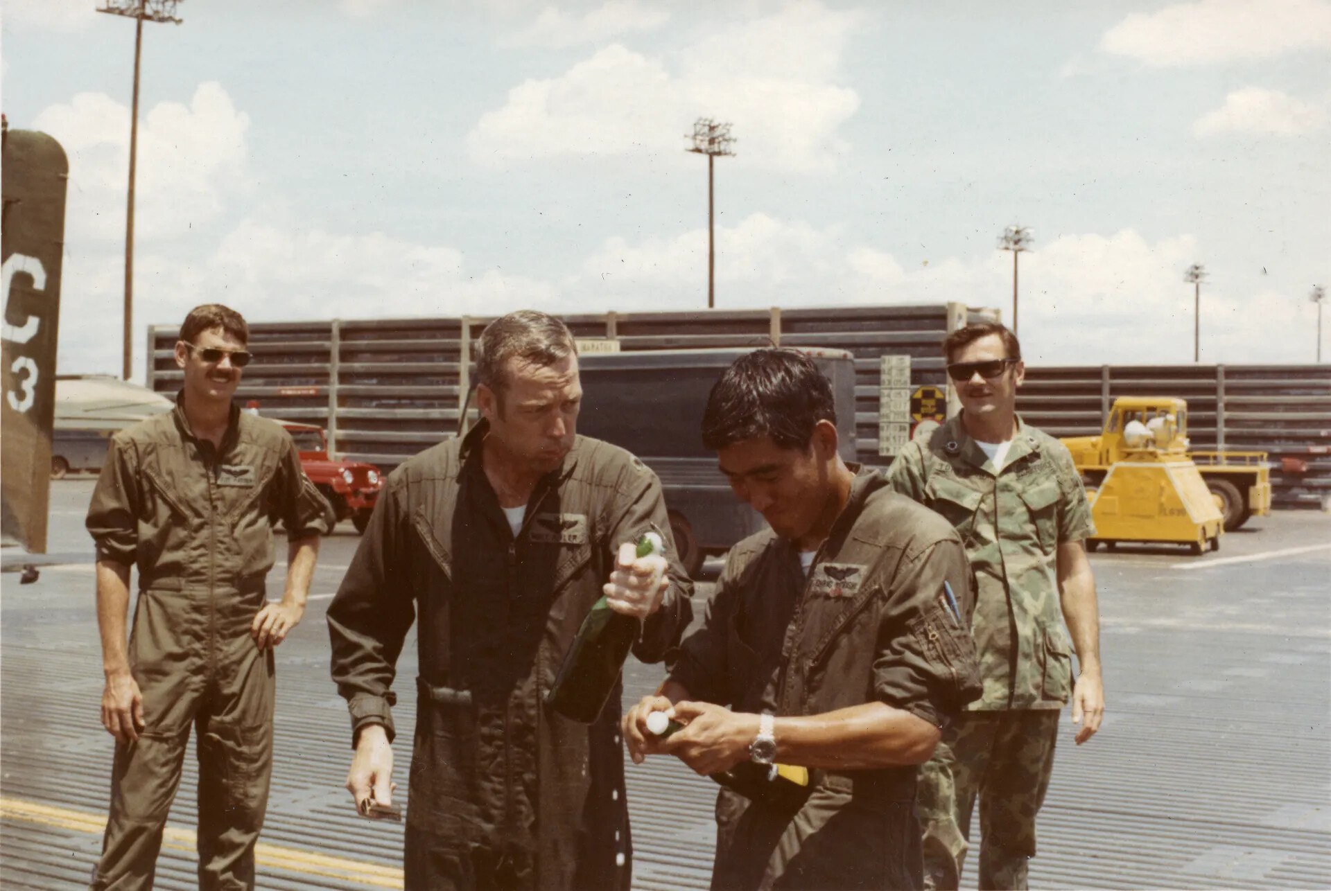 Aircrew 'Hose Down' Champagne Celebration, NKP Flightline, Vietnam War Era