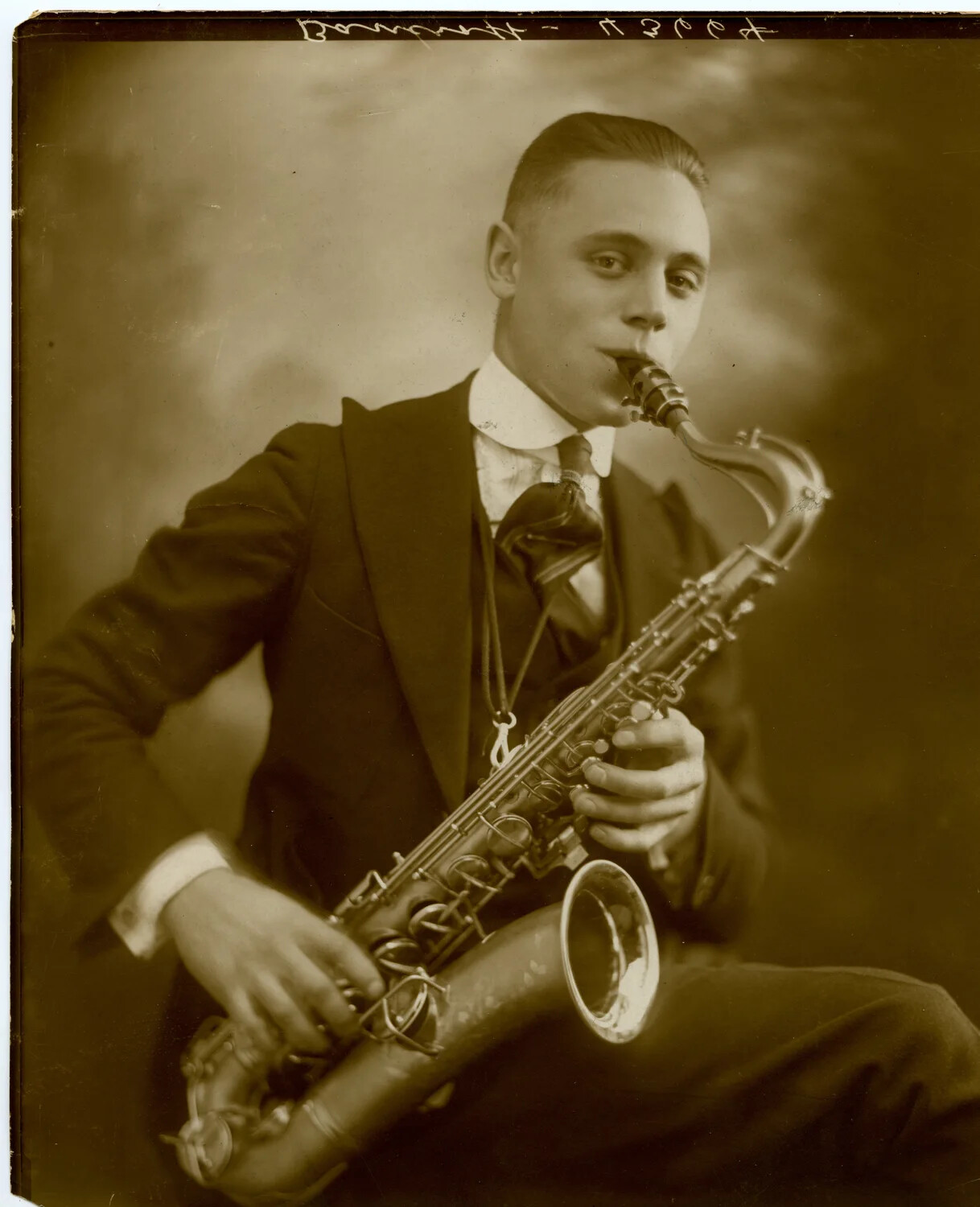 Studio Portrait of a Young Man Playing Saxophone, Early 20th Century (Bancroft Family Collection)